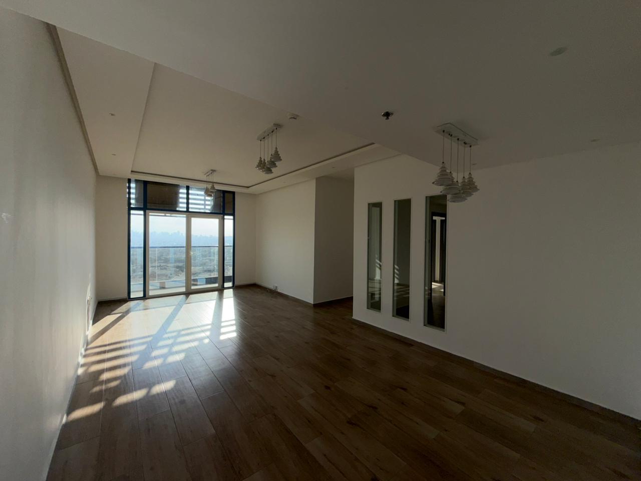 Three bedrooms, a living room, three bathrooms, and a balcony with an open view. First occupancy. Tower in an excellent location in Al Nuaimiya 3, clo