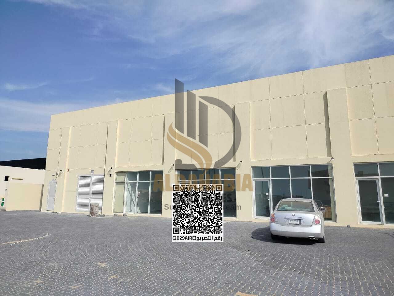 A brand new showroom and warehouse available for rent in a prime main road location in Umm Al Thoub, suitable for various commercial and industrial a