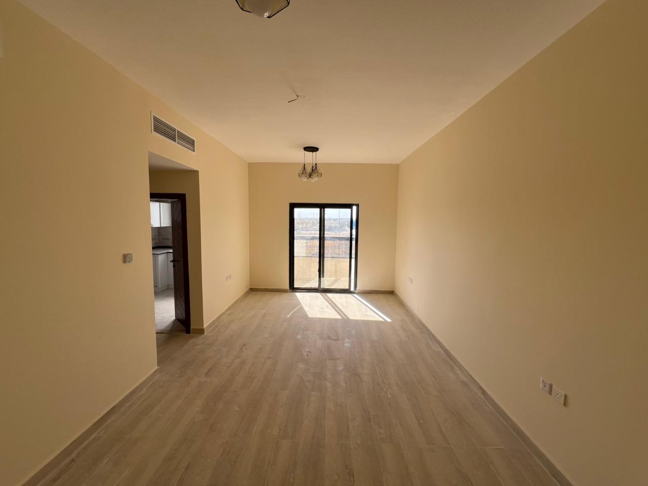 One bedroom and living room for annual rent in Al Jurf 3, near Al Qabail Discount Center. Two bathrooms. With balcony.