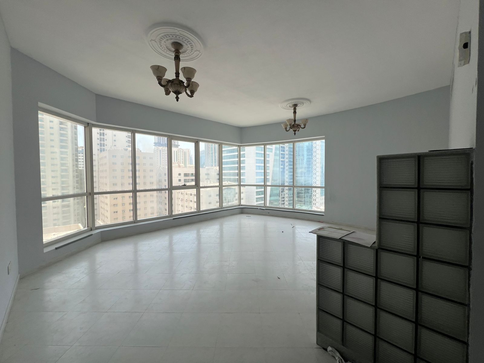 One bedroom and living room * with one month free + free gym, pool, and air conditioning * open view * close to Dubai exit * close to all services