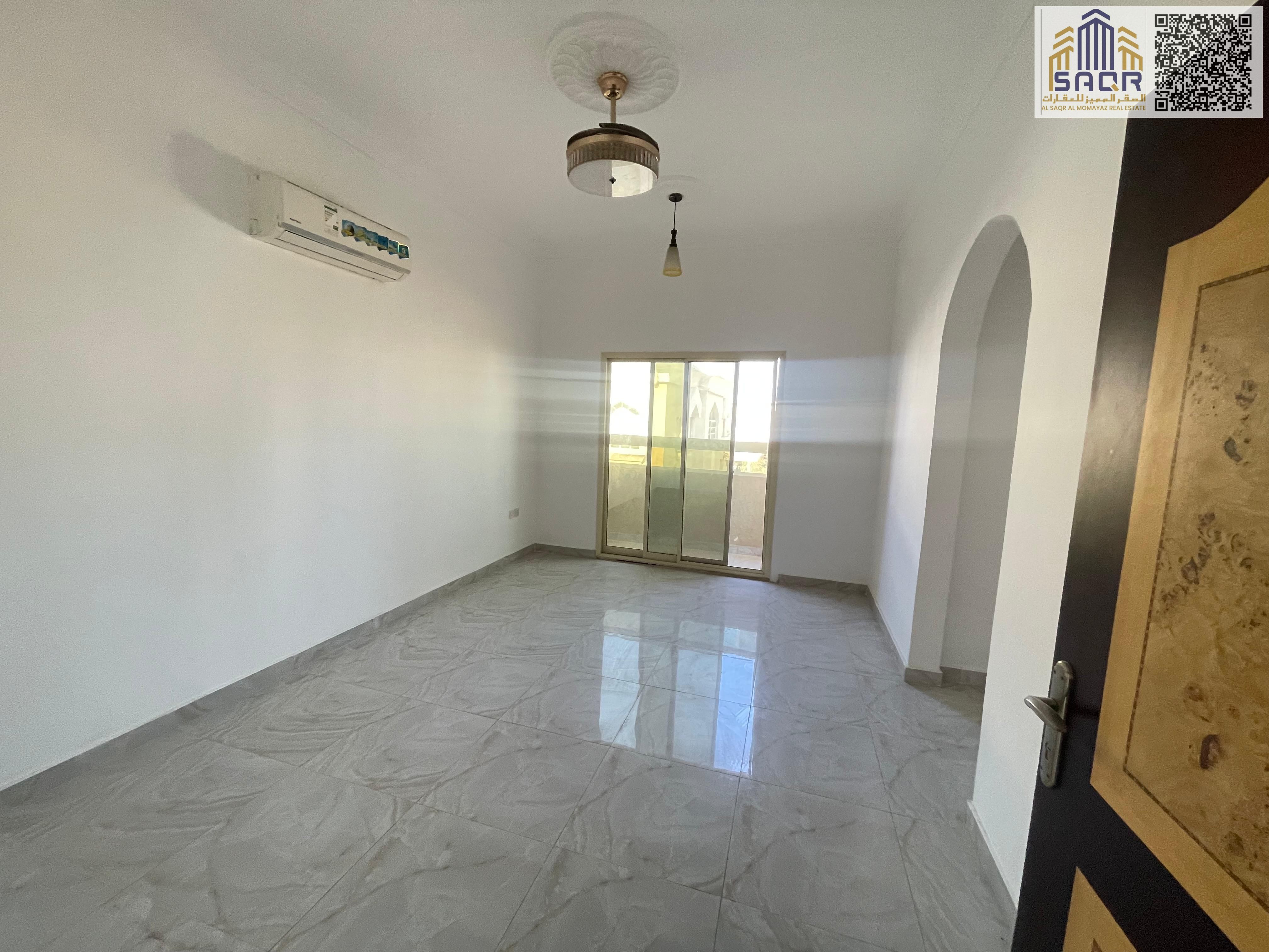 One bedroom and living room for annual rent in Al Rawda 3. Prime location, excellent price, spacious, close to all services, easy access to Dubai, Sha