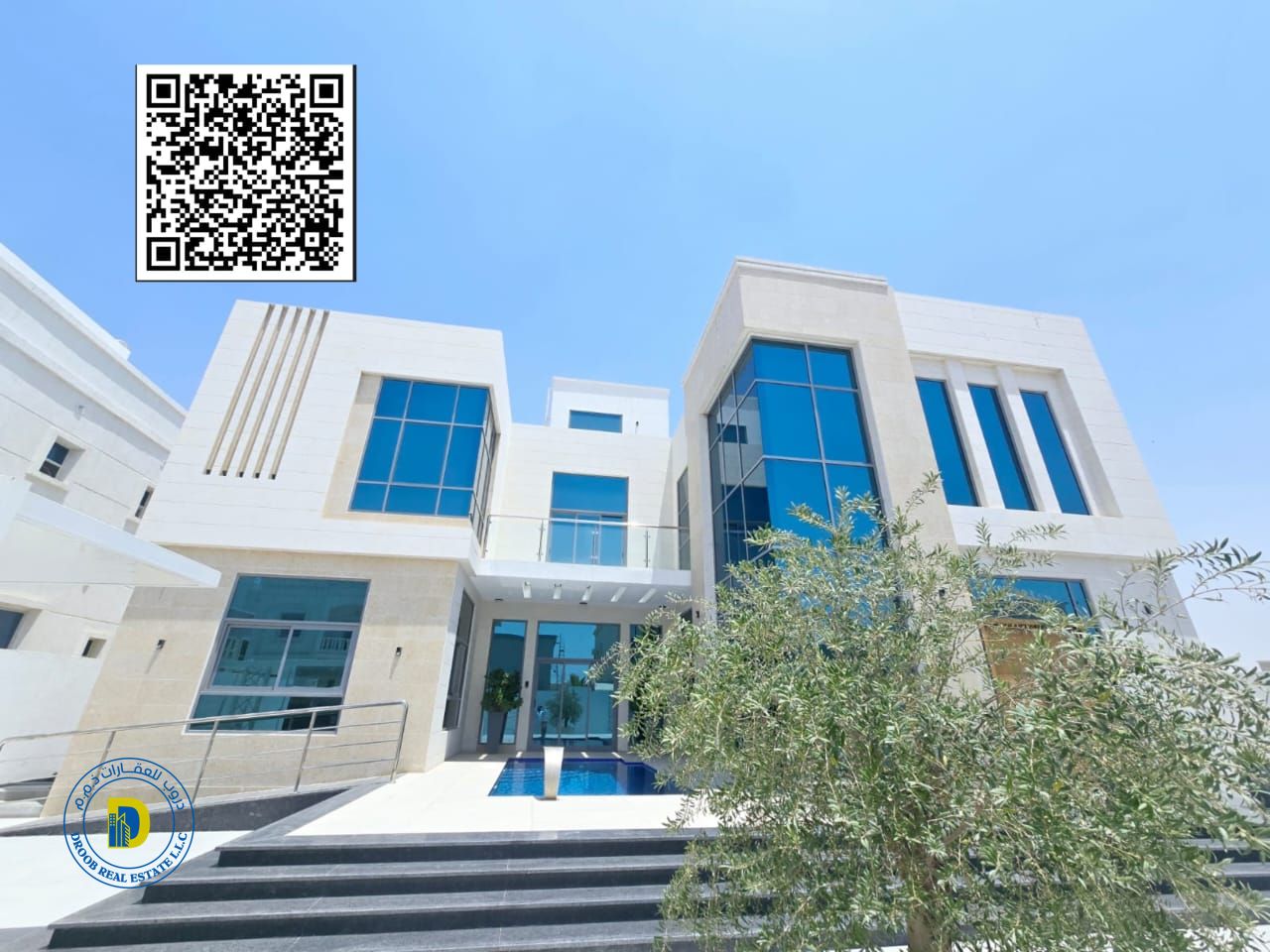 For sale: Modern villa with a large swimming pool, 6300 sq ft, in the Al Yasmin area.