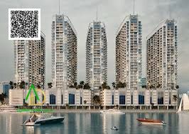 Own a two-bedroom apartment in the Creek Tower project, a fully serviced complex with direct views of Ajman Creek, featuring modern and elegant finish