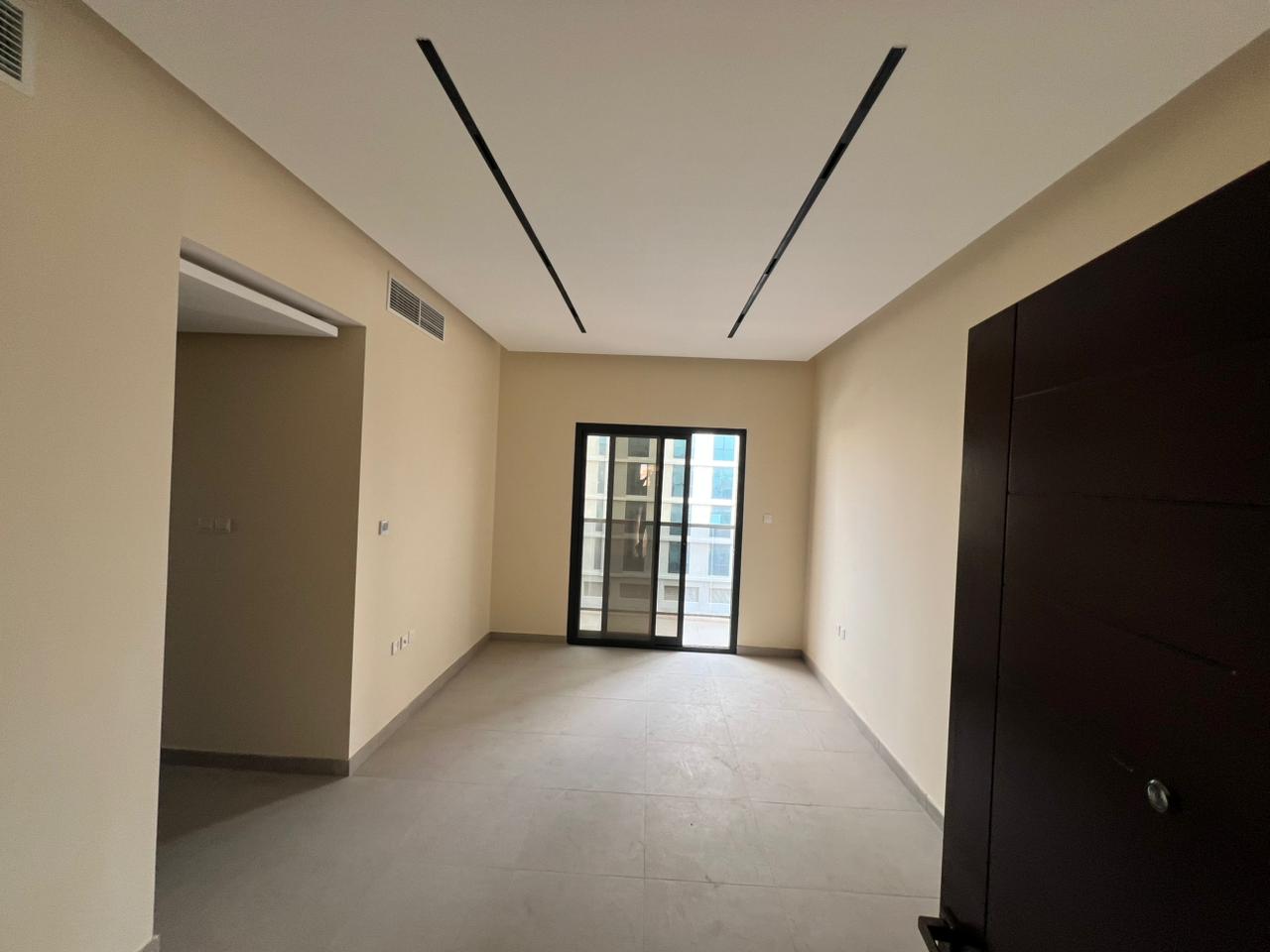 Beautiful apartments in a new building, second occupancy, two bedrooms and a living room, built-in wardrobes, central air conditioning, full maintenan