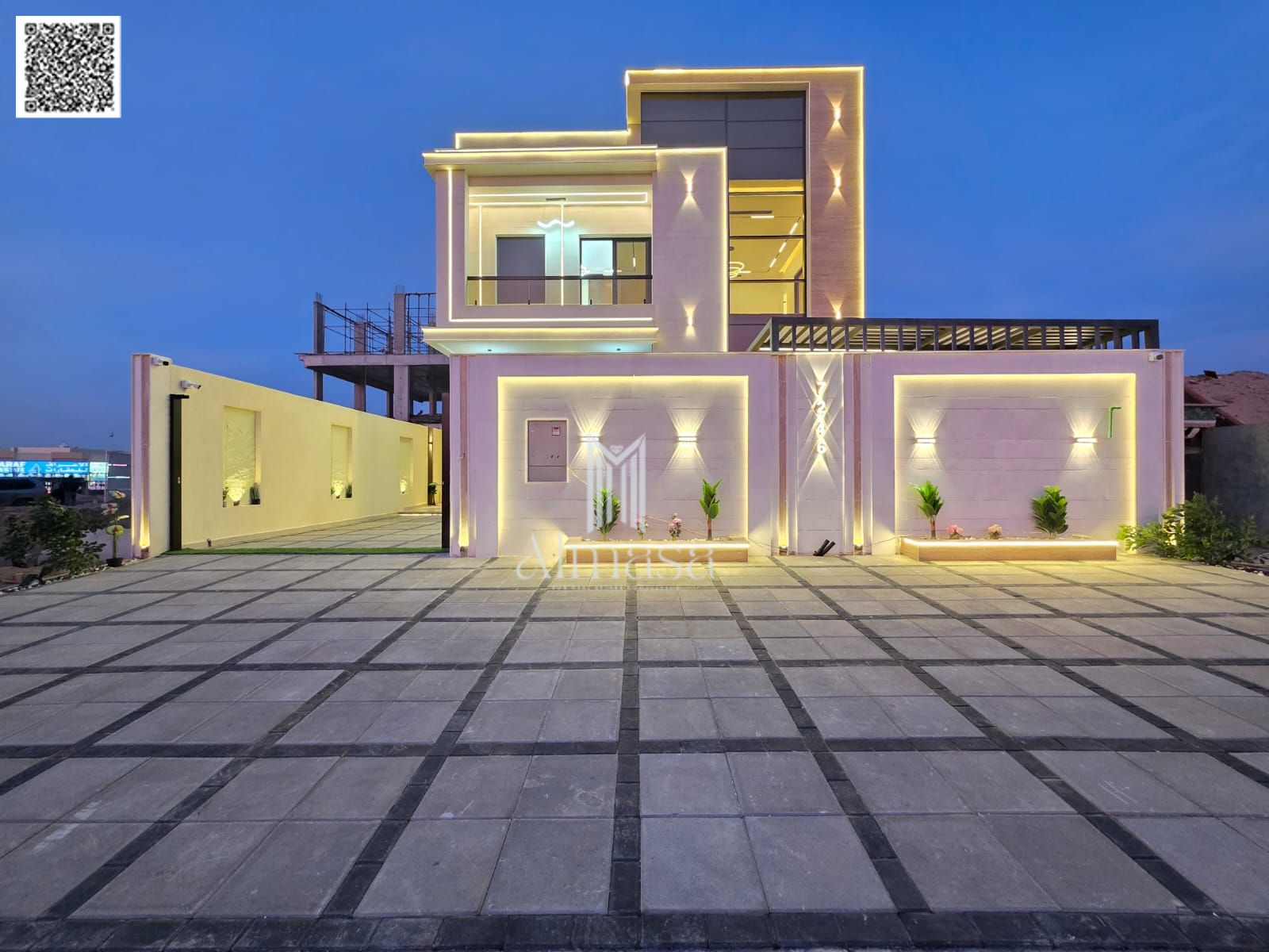 Own a luxurious two-story villa in Ajman with a large yard, modern design, and VIP finishing, at a price that includes registration and ownership fees