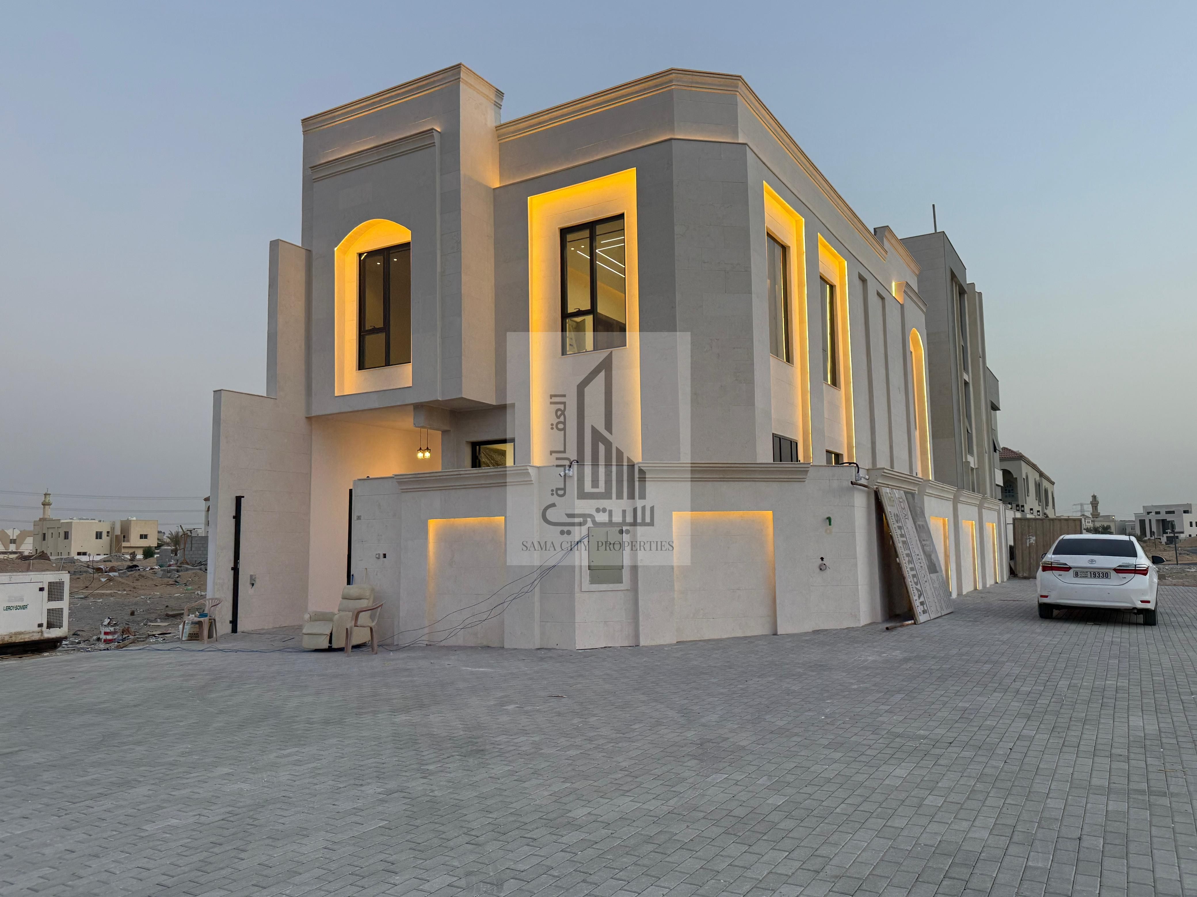 Freehold for all nationalities Luxury Modern Design Villa for Sale Al Helio 2 - Ajman On Sheikh Mohammed Bin Zayed Road Land Area 2800 sq m Built-up Area 3100 sq m Consisting of: - 4 Master Bedrooms - Majlis - Living Room - Large Main Kitchen -
