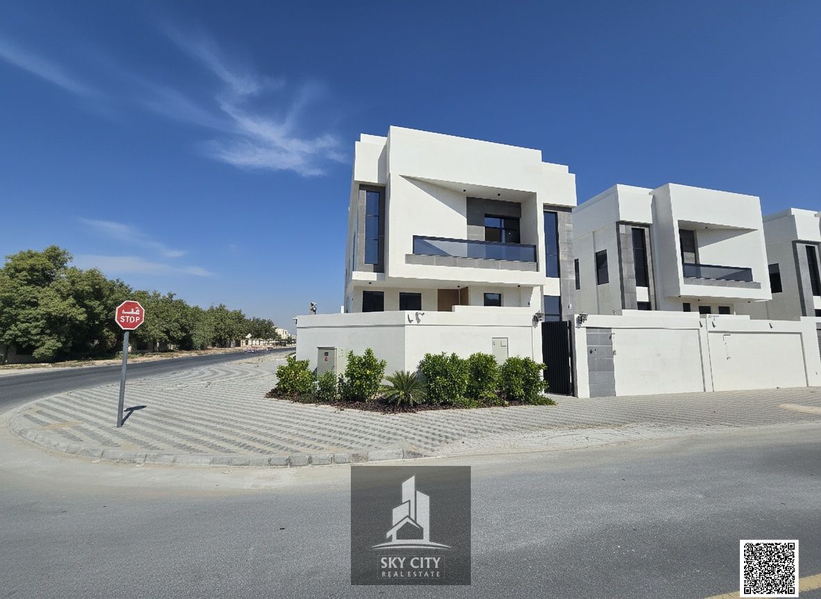 Luxury corner villa, including registration fees, 5 rooms, super deluxe finishing, behind Al Qabail Mall, central air conditioning units, 5 minutes from Emirates Road, ready to move in, directly from the owner and without annual fees
