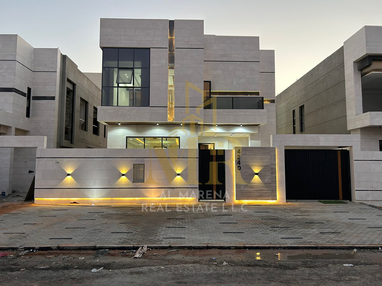 Modern villa for sale in Al Helio 2, Ajman. Excellent location on a main street. Two floors. Price includes registration fees. Land area: 3014 sq ft.
