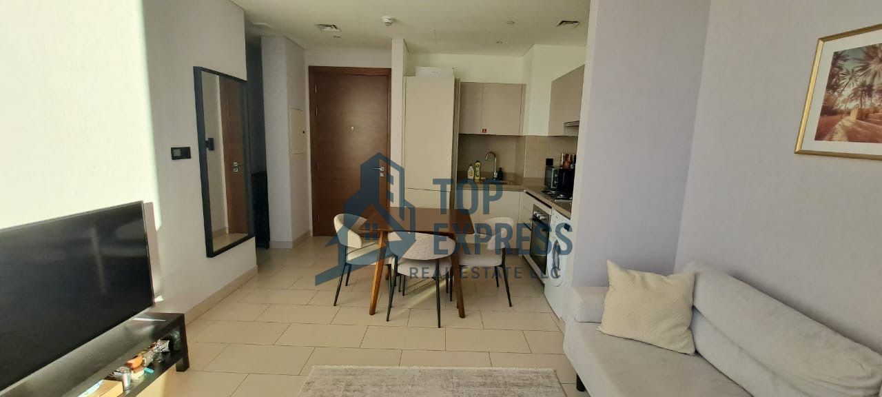 Stylish 1-Bedroom Apartment | Fully Furnished | Pool and Burj View |