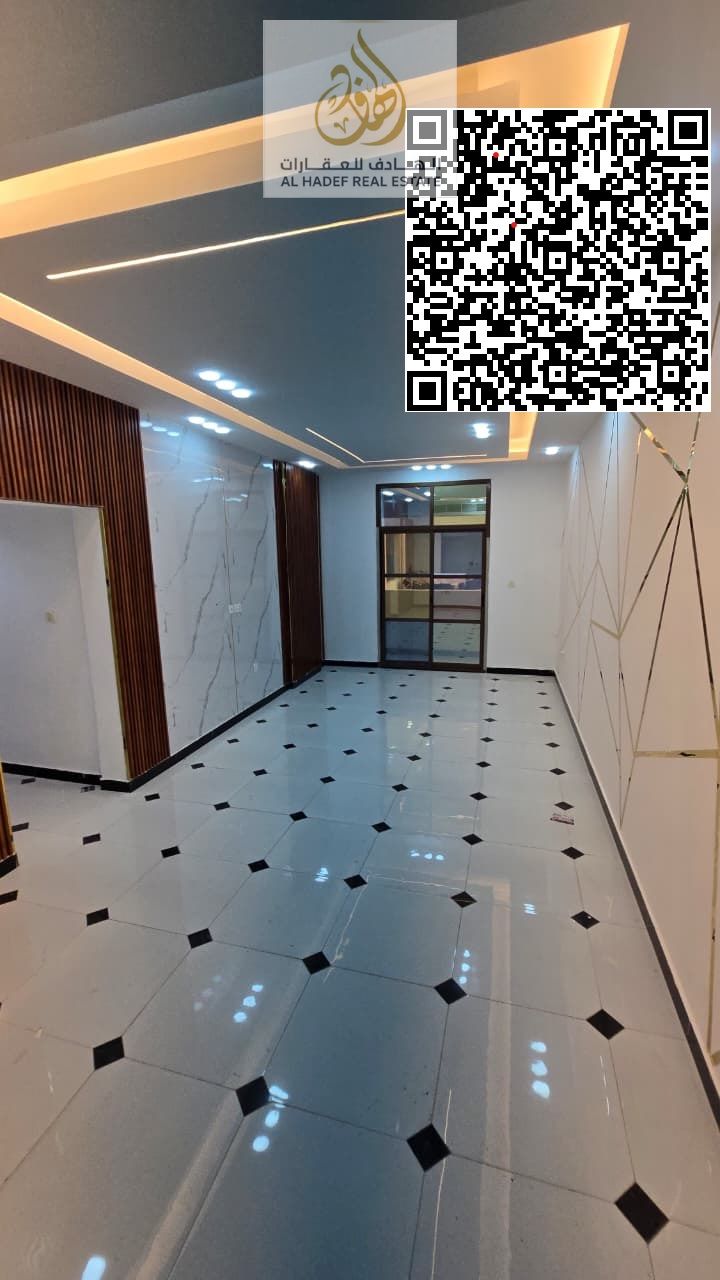 Two bedrooms, a living room with a balcony, two bathrooms, elegant and distinctive design in Al Rawda