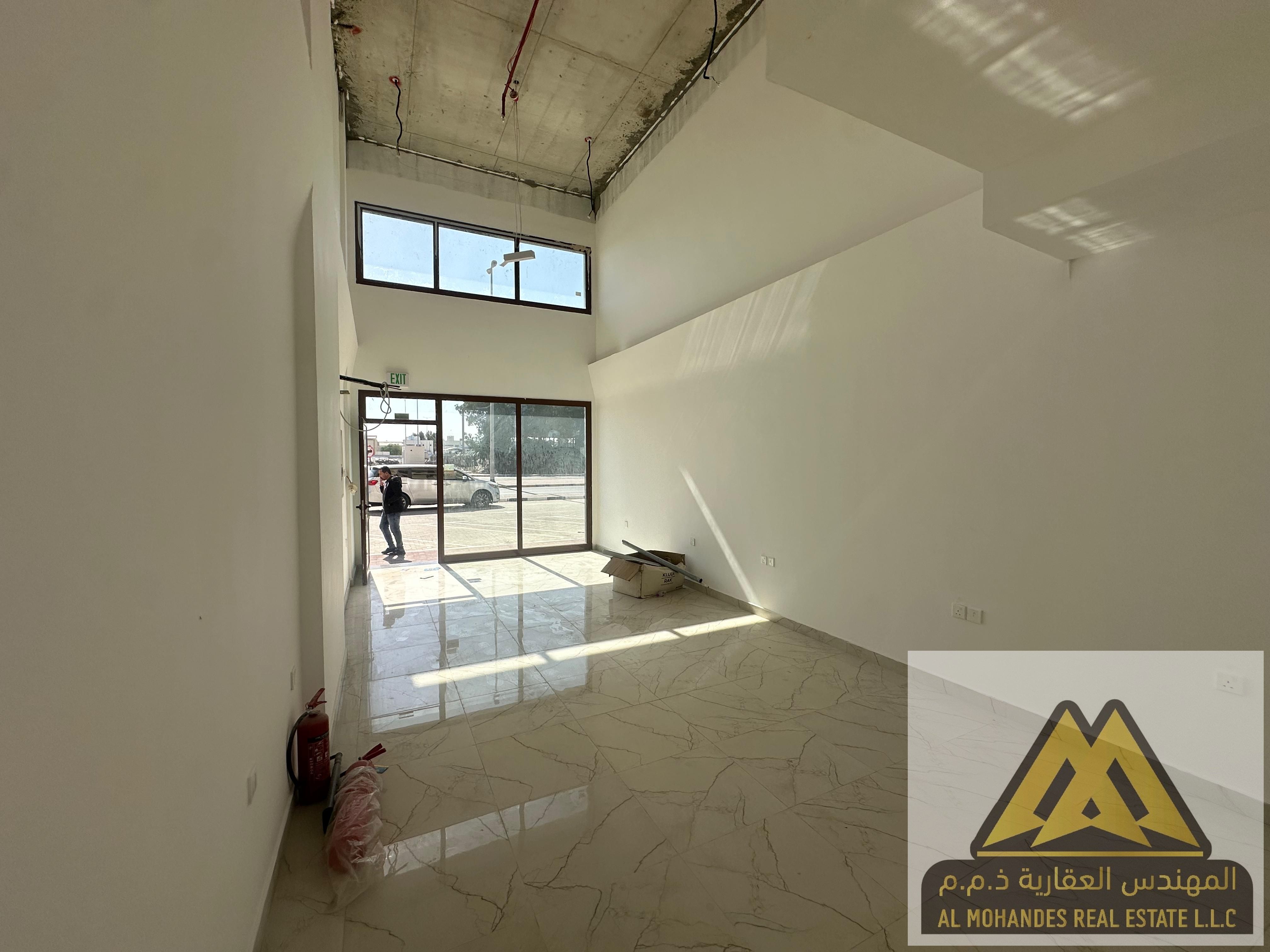 Commercial shop for annual rent in Al Jurf Industrial 2, Ajman – approx. 600 sq. ft. , water & electricity connected, civil defense approved,AED 50,0000