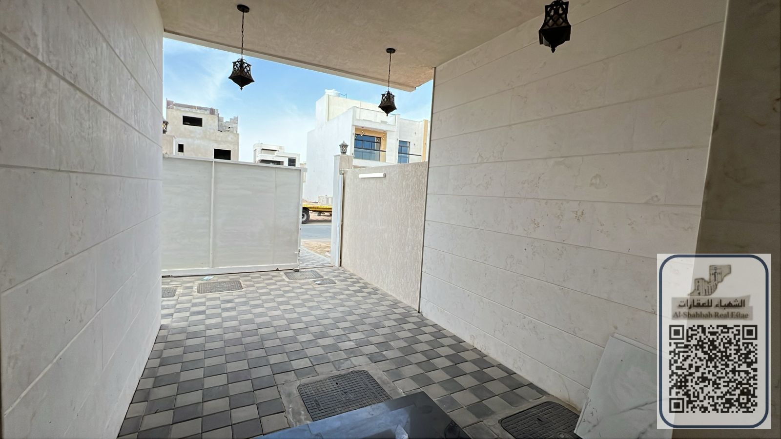 A villa in Al-Zahia, with electricity, owned by a citizen, featuring 3 master bedrooms, a maid's room, and 2 kitchens.