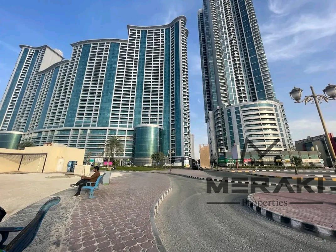Apartment for sale with 2 bedrooms and a living room, spacious area of 2,119 sq. ft. in Corniche Towers, immediate delivery.
