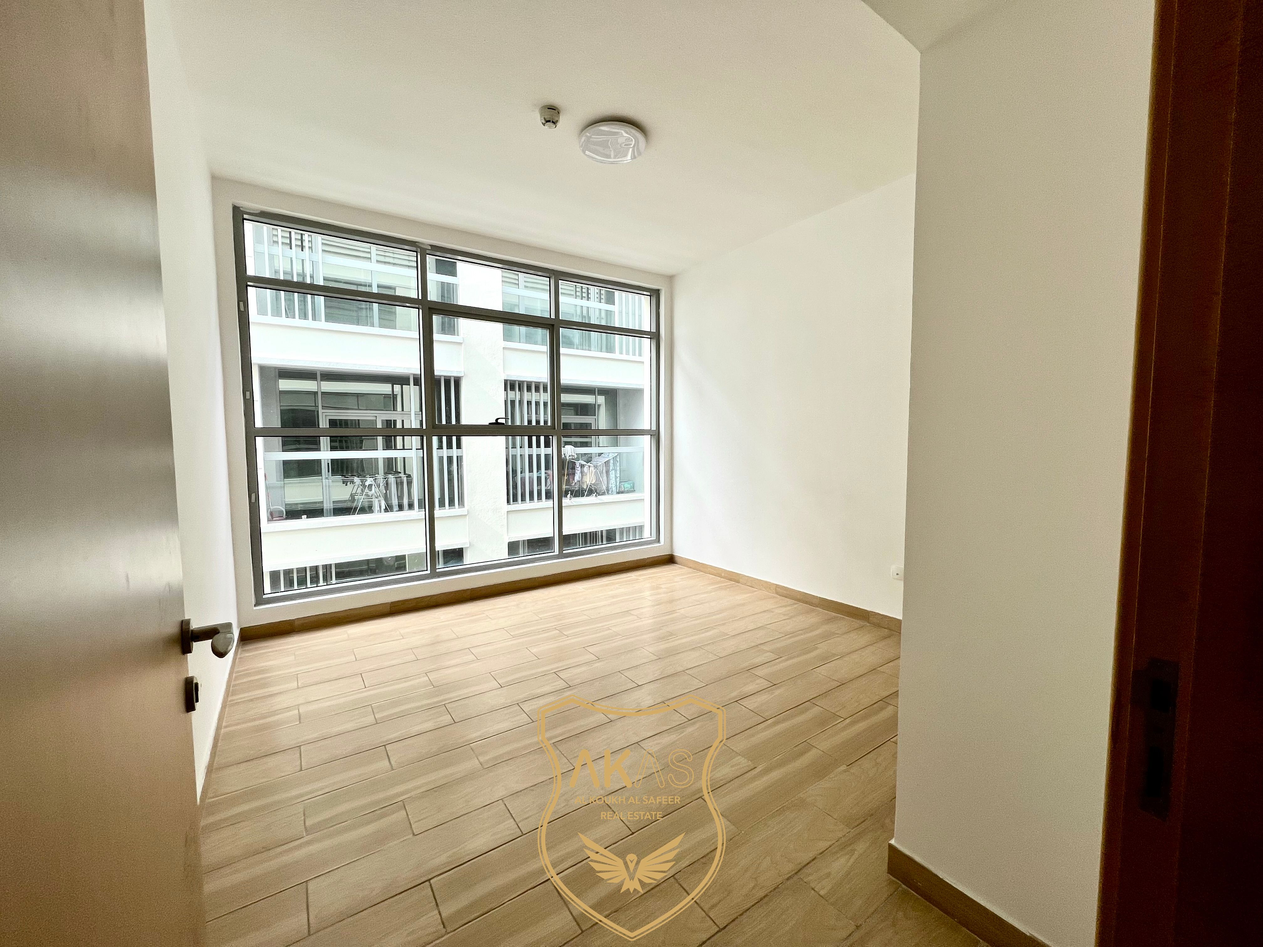 Elegant Spacious 2BHK | Master Bedroom | Wooden Floor