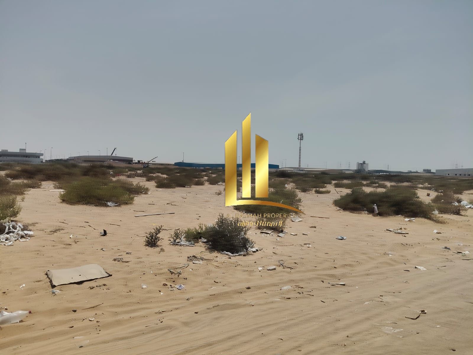 Corner plot of land for sale in Sharjah, Al Sajaa Industrial Area S. Owned by UAE nationals and GCC citizens.