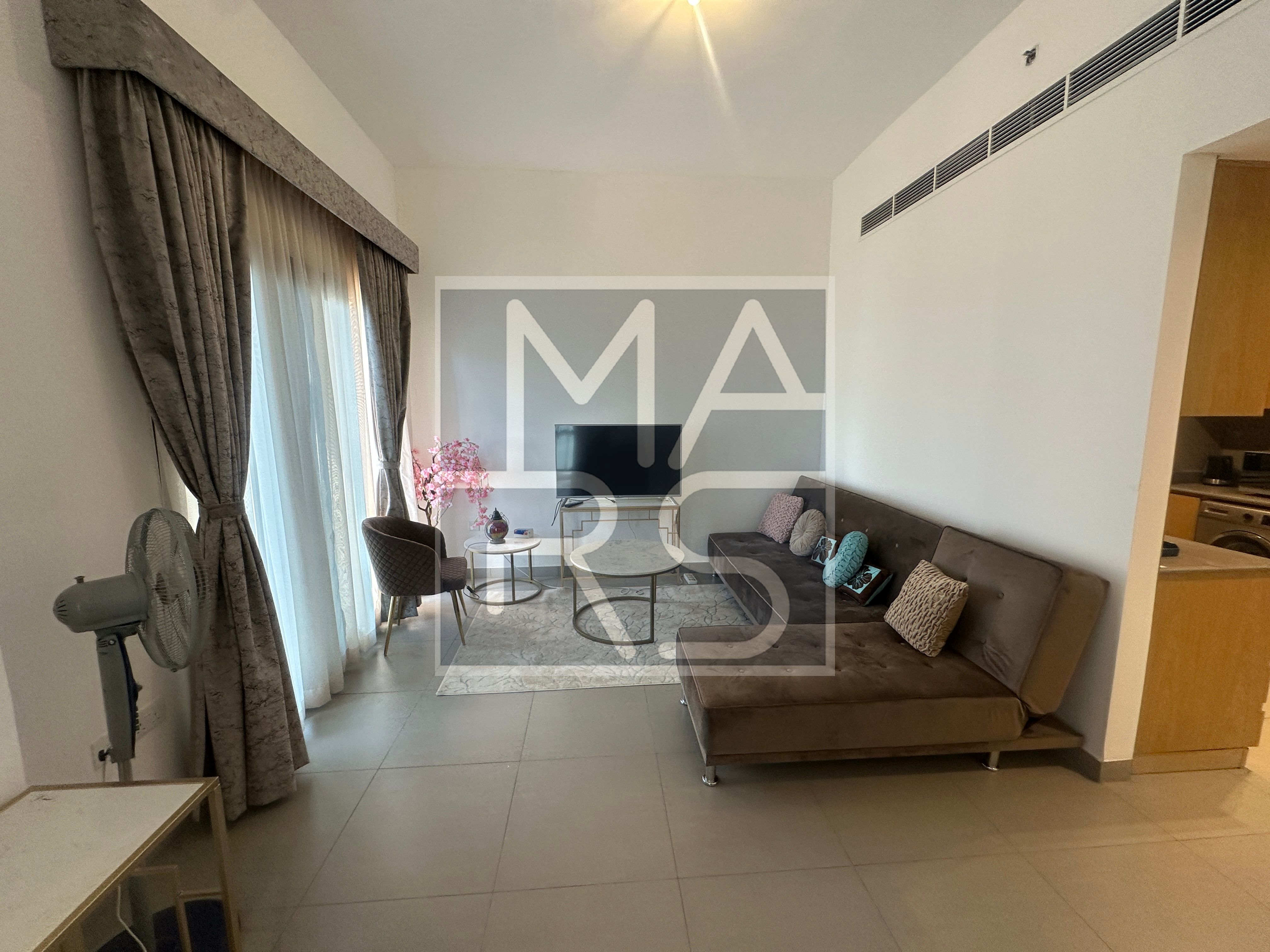 Modern 1 BHK Apartment with Balcony and Semi-Closed Kitchen
