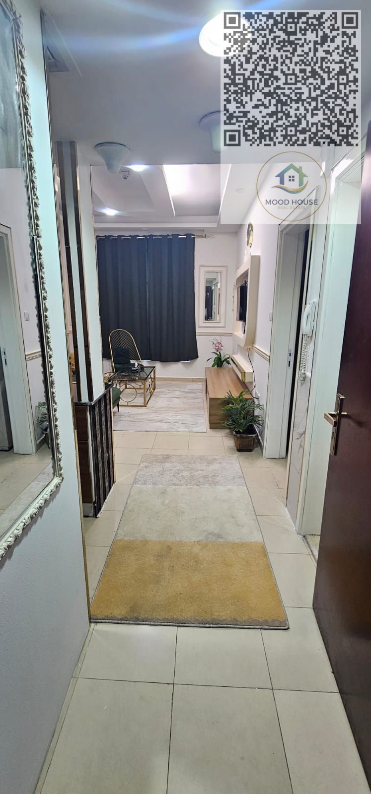 One-bedroom apartment with a living room in City Tower Towers, featuring a direct view of the Ruler’s Palace, with parking, fully furnished.
