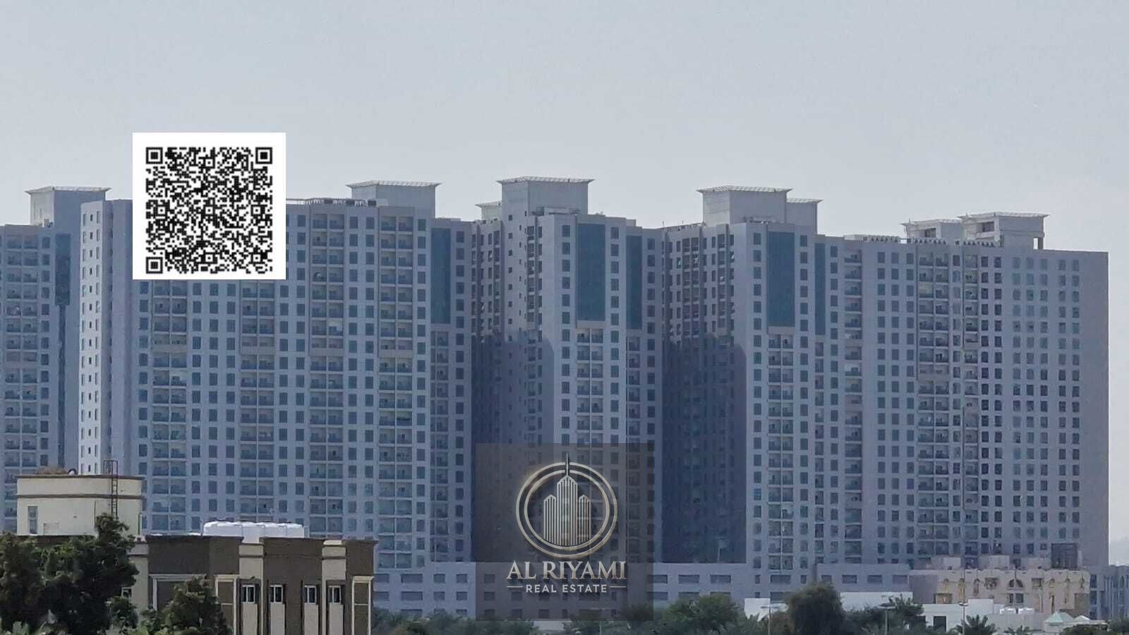 Two-bedroom apartment with a living room and balcony for rent in Al Rashidiya 2, near Falcon Towers