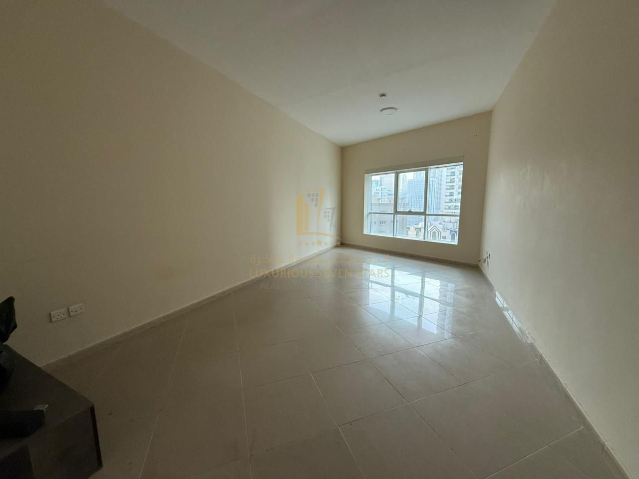 For Sale One-Bedroom Apartment with Living Room in Najmat Al Qanah Tower