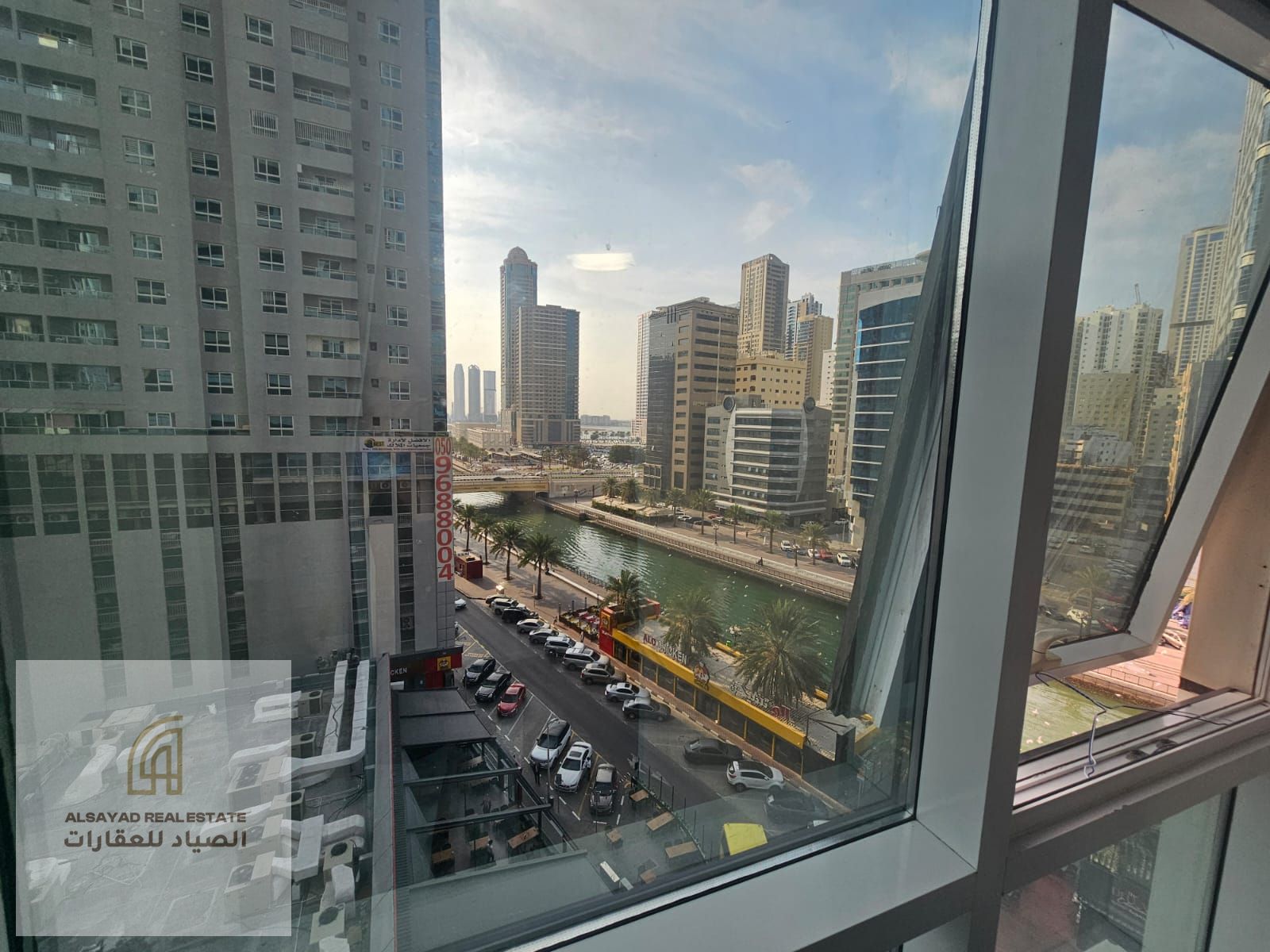 Apartment for sale, currently rented for AED 53,000, with service charges of AED 6,500, including two parking spaces. Price: AED 680,000.