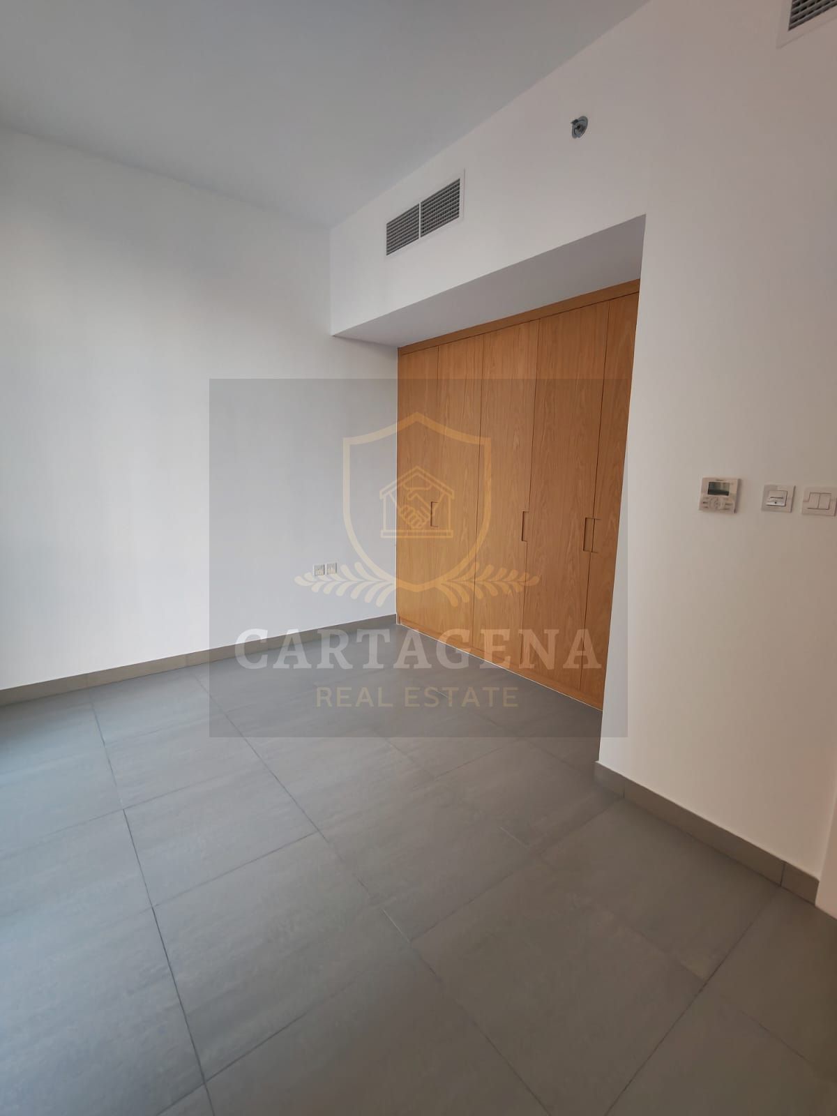 Modern 1 BR Apartment with Built-in Wardrobes in Souks Residential
