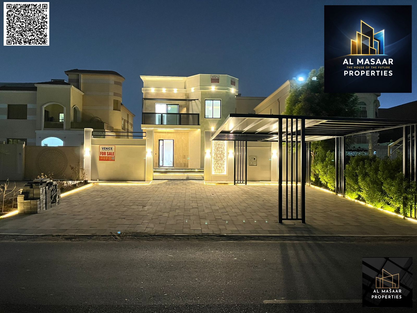 Luxury villa for sale in Al Muwaihat, Ajman, with a swimming pool, price includes electricity, water, and air conditioning.