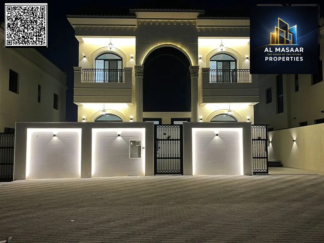 Own your dream villa in the heart of Ajman, close to all amenities, registration fees included, opposite a mosque, with a large swimming pool, near Az