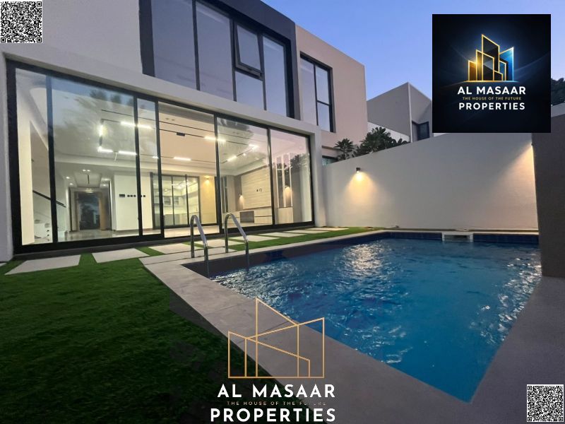 Luxury villa in the heart of Al Zorah golf courses, surrounded by nature, including electricity, water, and air conditioning.
