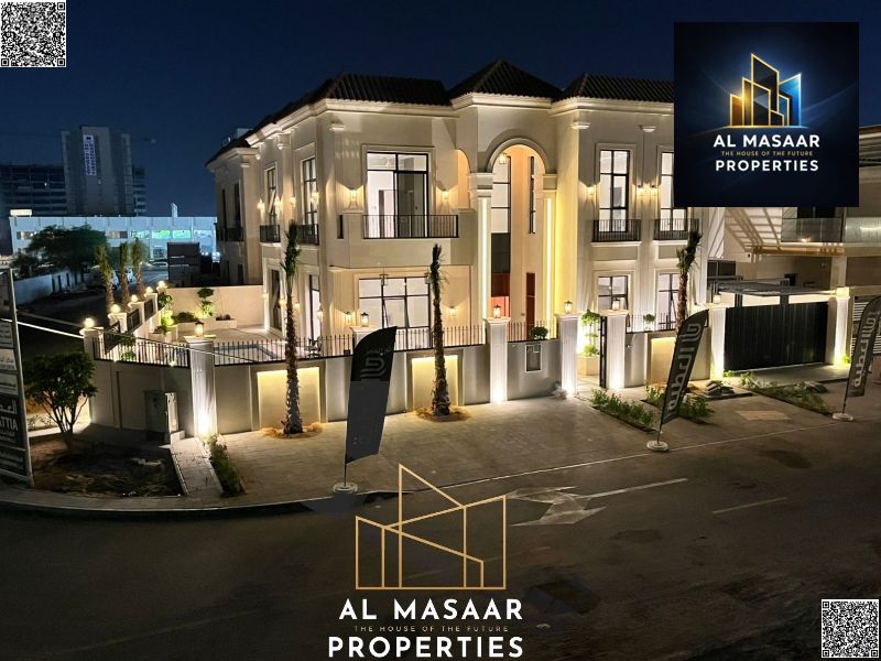 Luxury villa in Al Yasmin with a swimming pool and views of Al Hamidiya Park, ready for immediate occupancy and includes air conditioning, water, and