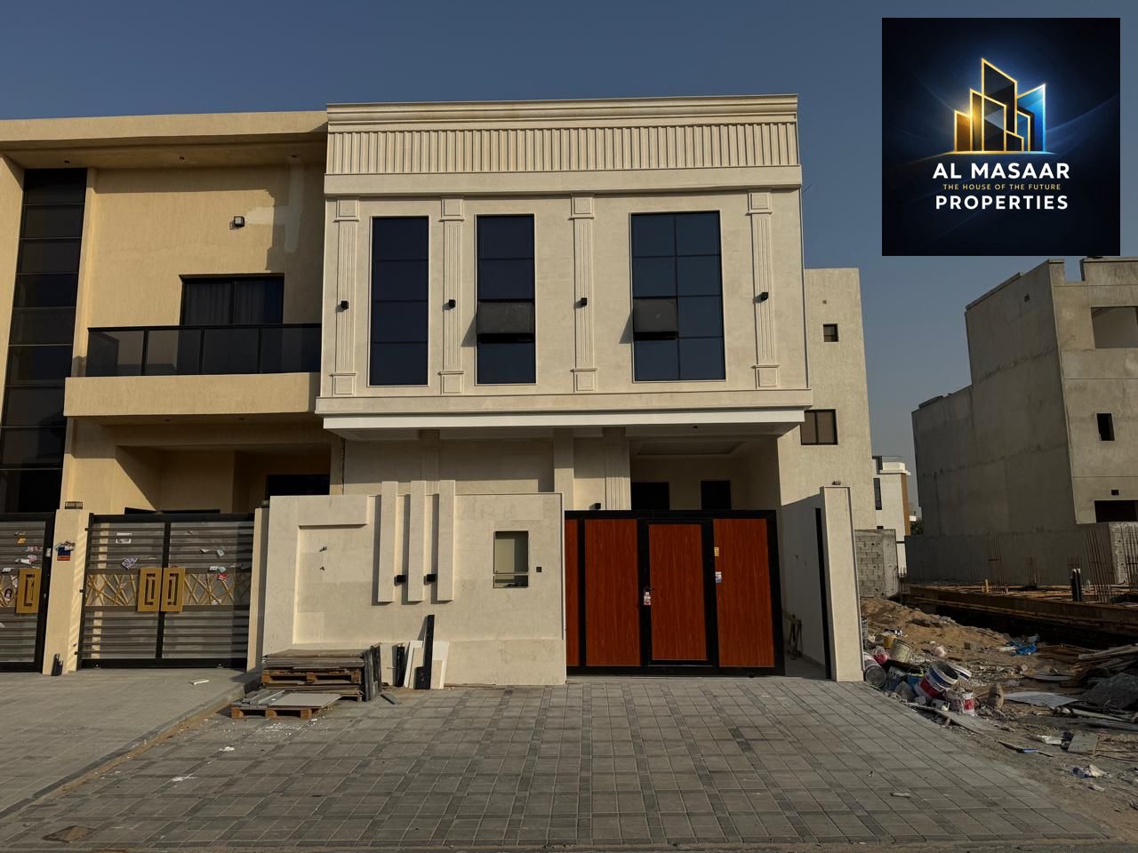 Luxury classic townhouse with a roof terrace and custom finishing, including registration fees, for sale in Al Zahia area - Ajman