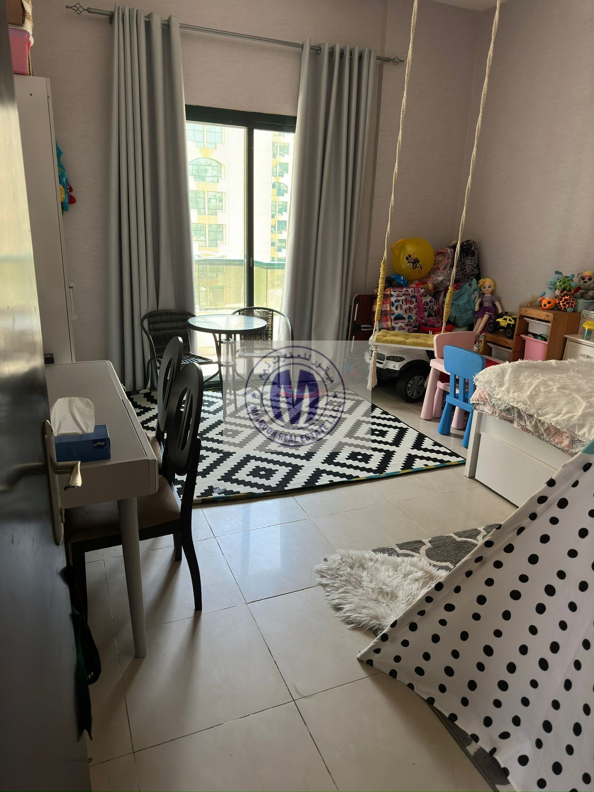 A beautiful and spacious two-bedroom apartment with a living room and two bathrooms in Al Rashidiya Towers is for sale.