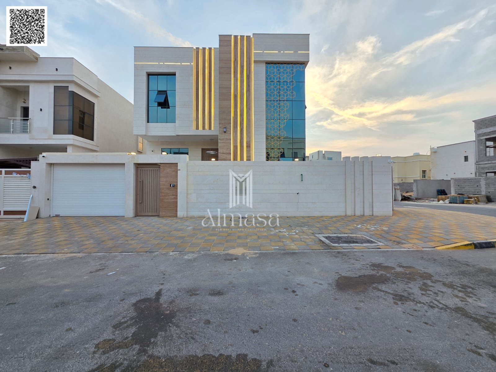 Own a two-story corner villa with a roof terrace and a large yard. European design, VIP finishing, very prime location behind Al Qabail Mall.