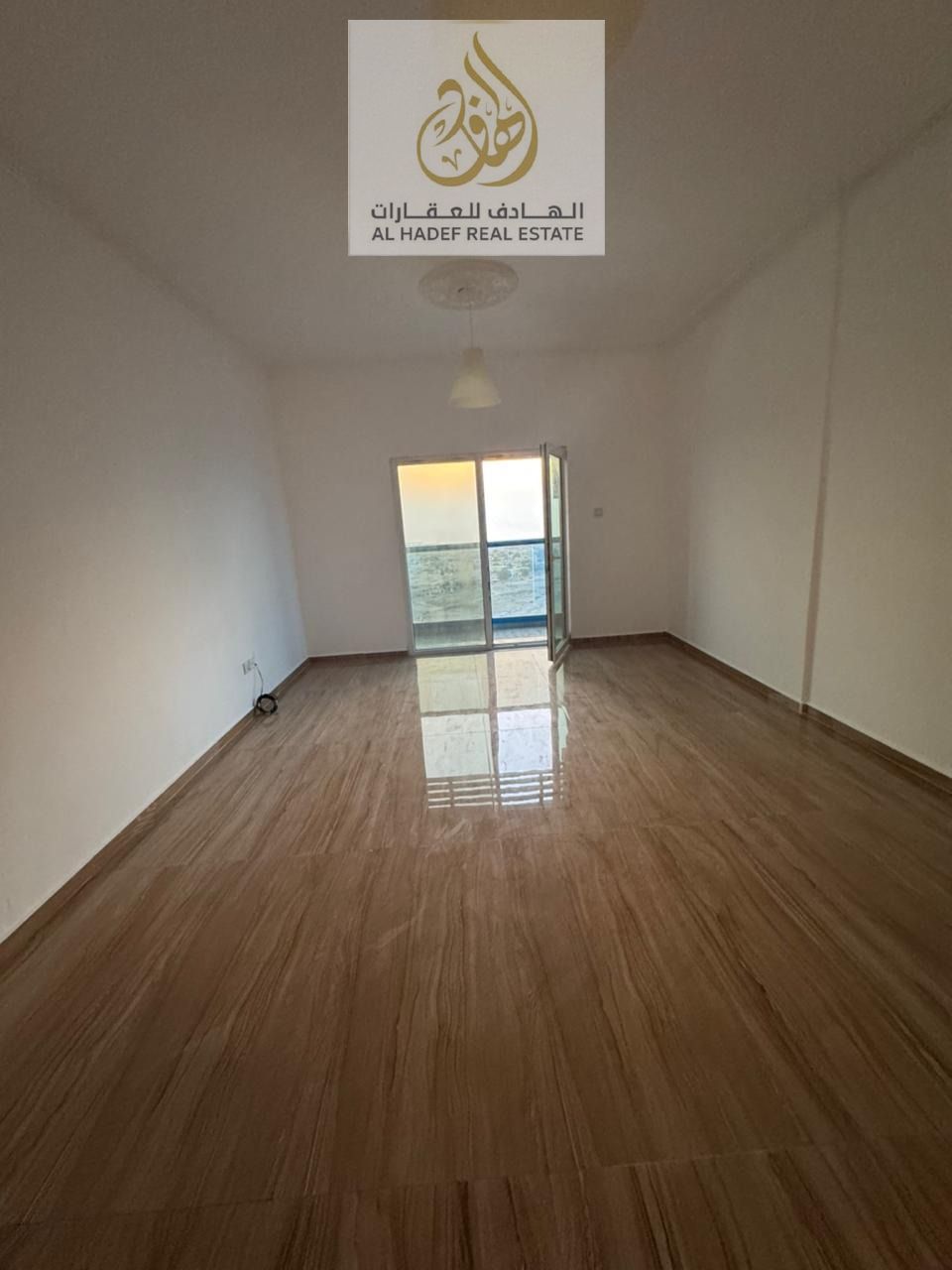 One bedroom, living room, and two bathrooms. First occupancy. Includes private parking inside the tower. Prime location near Dubai exit and close to a