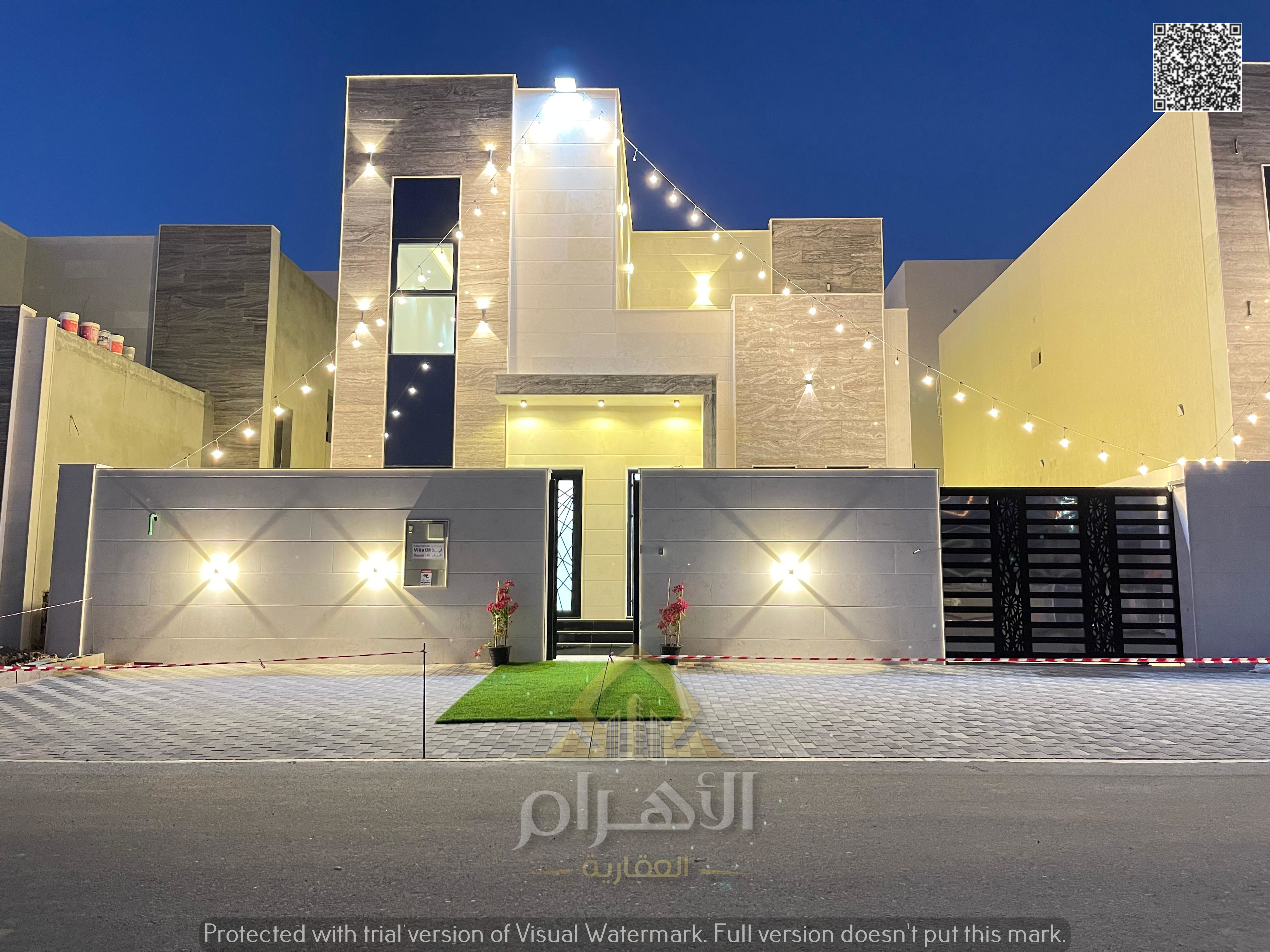 Villa for sale – Al Helio 2, Ajman | 4 master bedrooms + Majlis + Living room + Maid's room | Modern luxury design | Registration fees included - no a