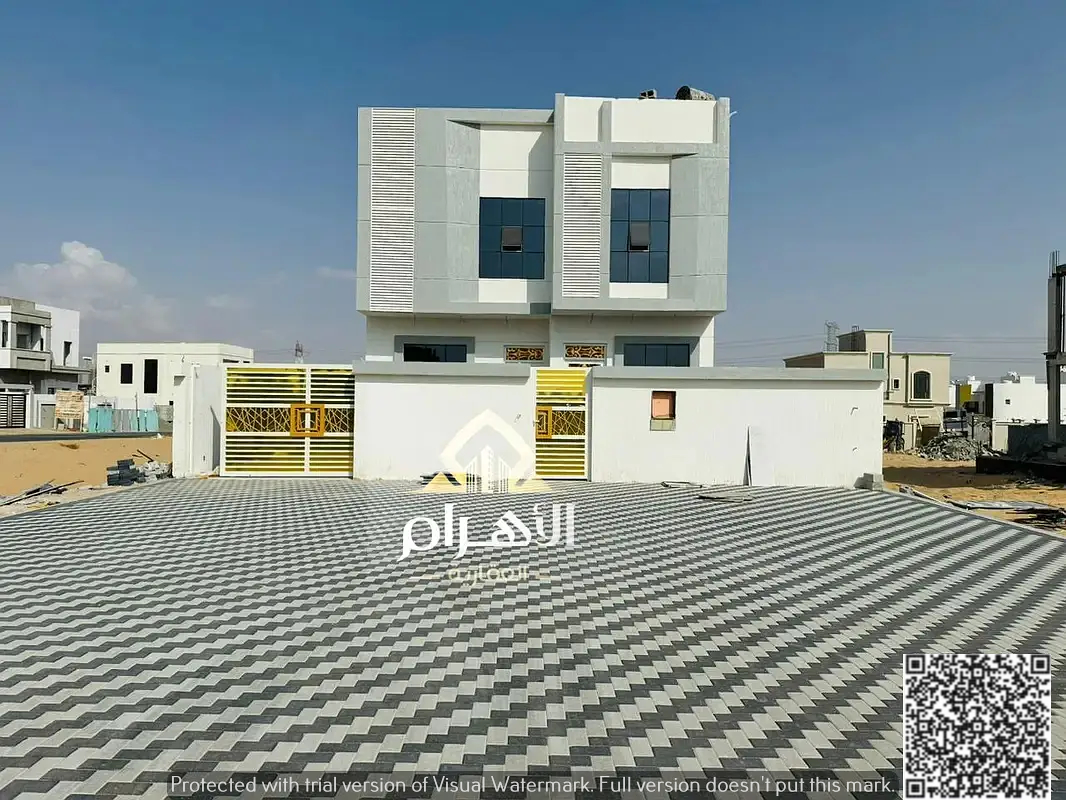 Luxury two-story villa for sale in Al Helio 2 area, Ajman. Modern design and prime location at an attractive price including registration and ownershi