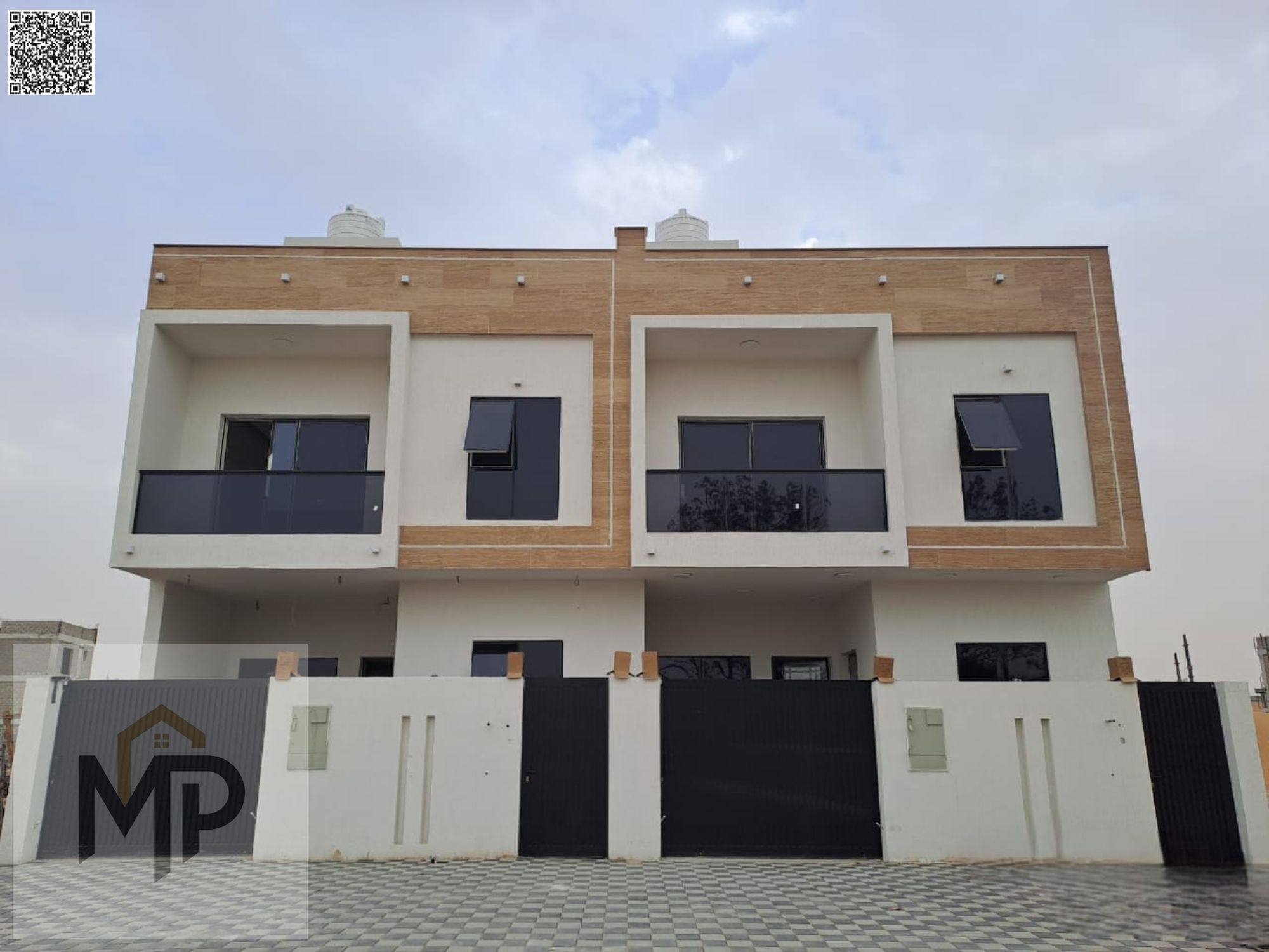 Townhouse for sale at ajman| al zahia area| 4 master rooms, majlis, hall, maid room, roof | freehold | price including registration.