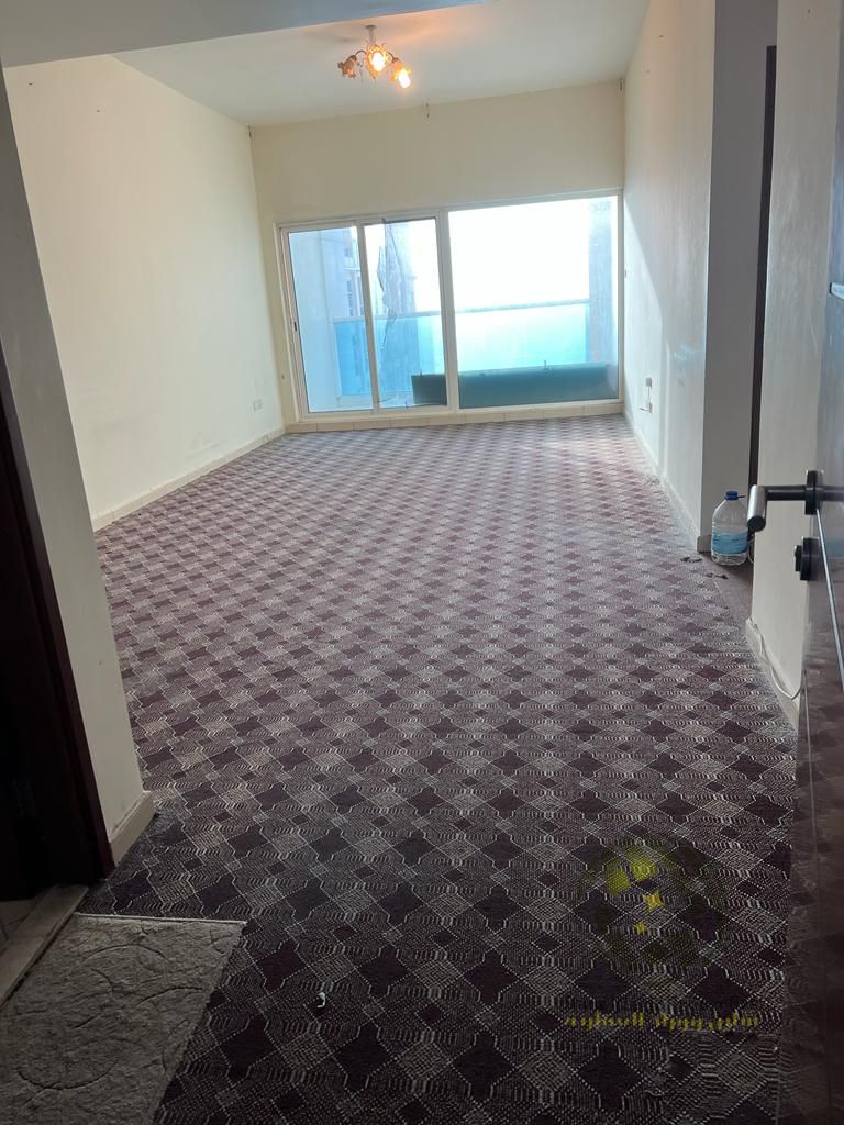 For sale One-bedroom apartment with a living room and balcony in Ajman One Towers
