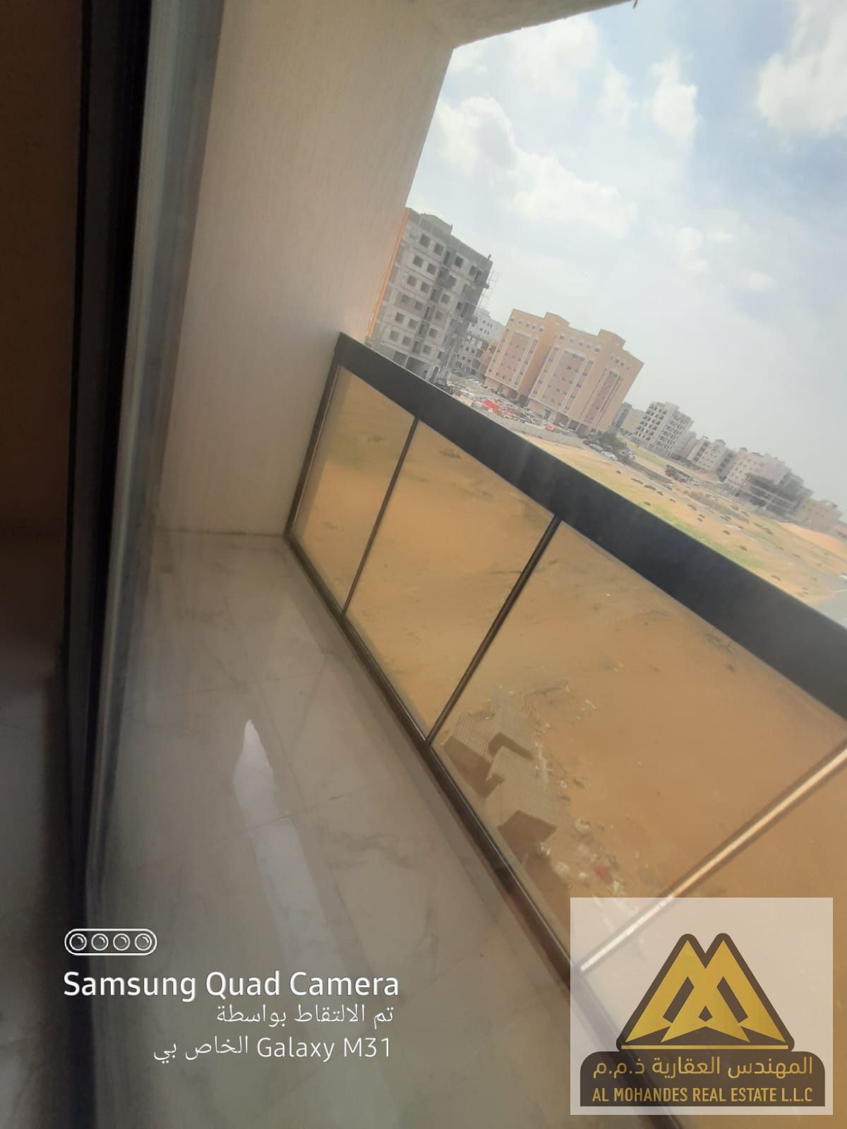 Apartment available for annual rent with 2 bedrooms, living room, 3 bathrooms, and balcony in Al Jurf 3, in a prime location close to all services.