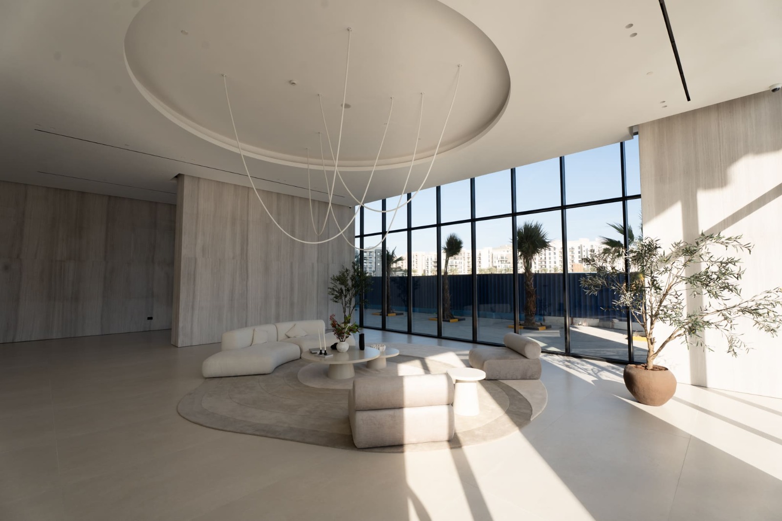 Apartment for rent in the 'Sharjah Terraces' project in the Al Khan Lagoon area, featuring stunning sea views, complete privacy, and spacious areas.
