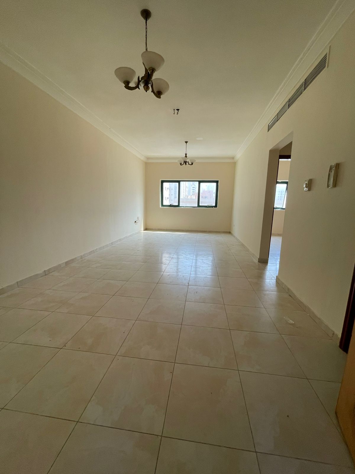 1-bedroom and hall in Sharjah, Abu Shagahra - Central AC - Large spaces - Balcony - Kitchen - Open view