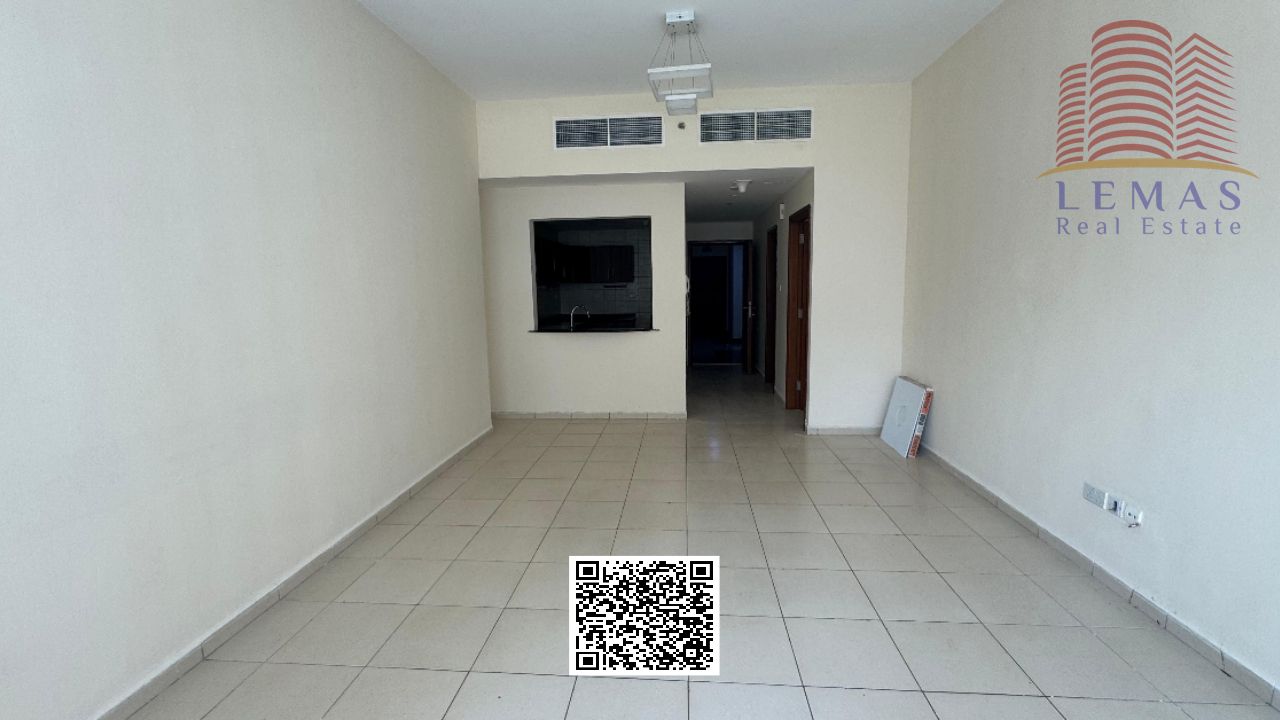 One bedroom, living room, open kitchen, and parking.