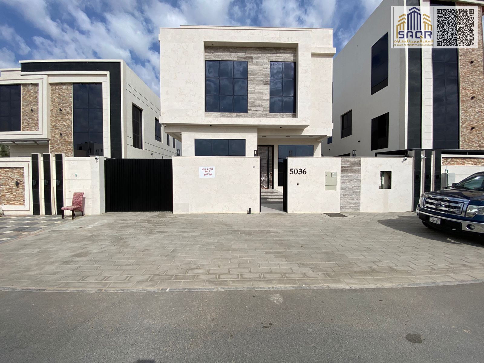 Luxury villa for sale in Al Yasmin, high-end stone finishing, registration fees included