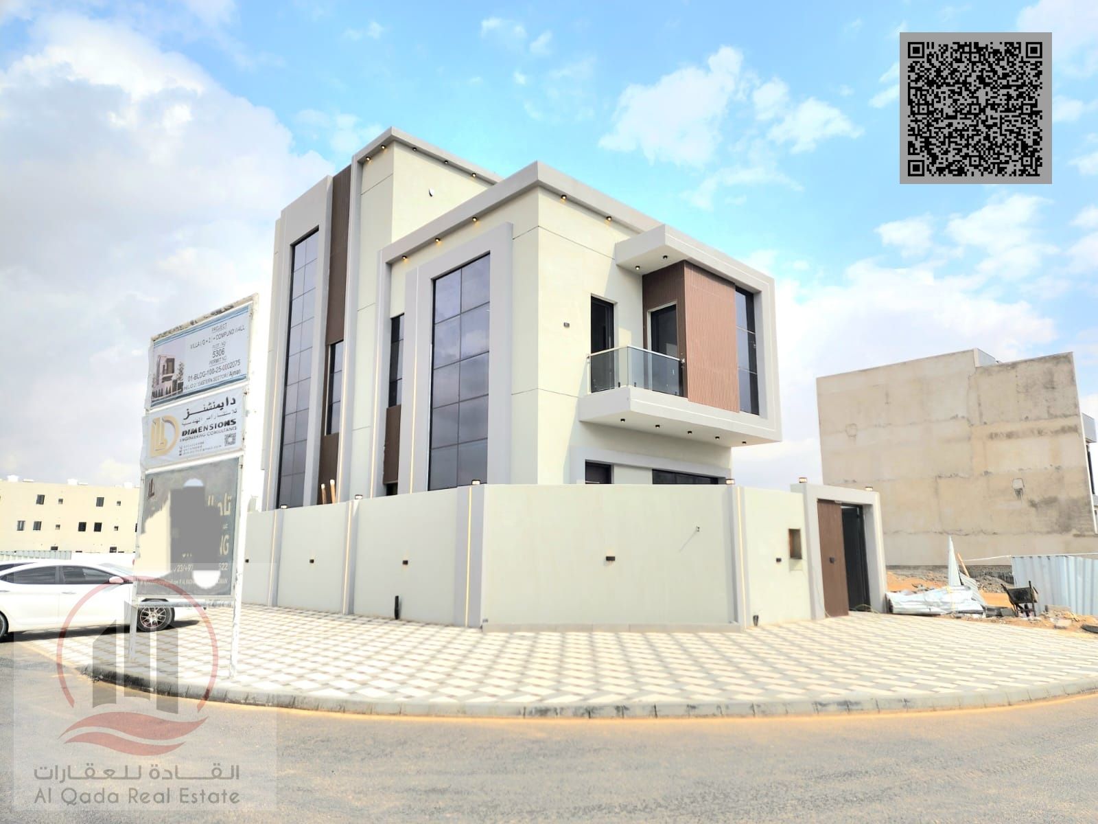 Villa for sale in Ajman, Al Helio area, including registration fees. It consists of 5 master bedrooms, a majlis, 2 living rooms, and a maid's room.