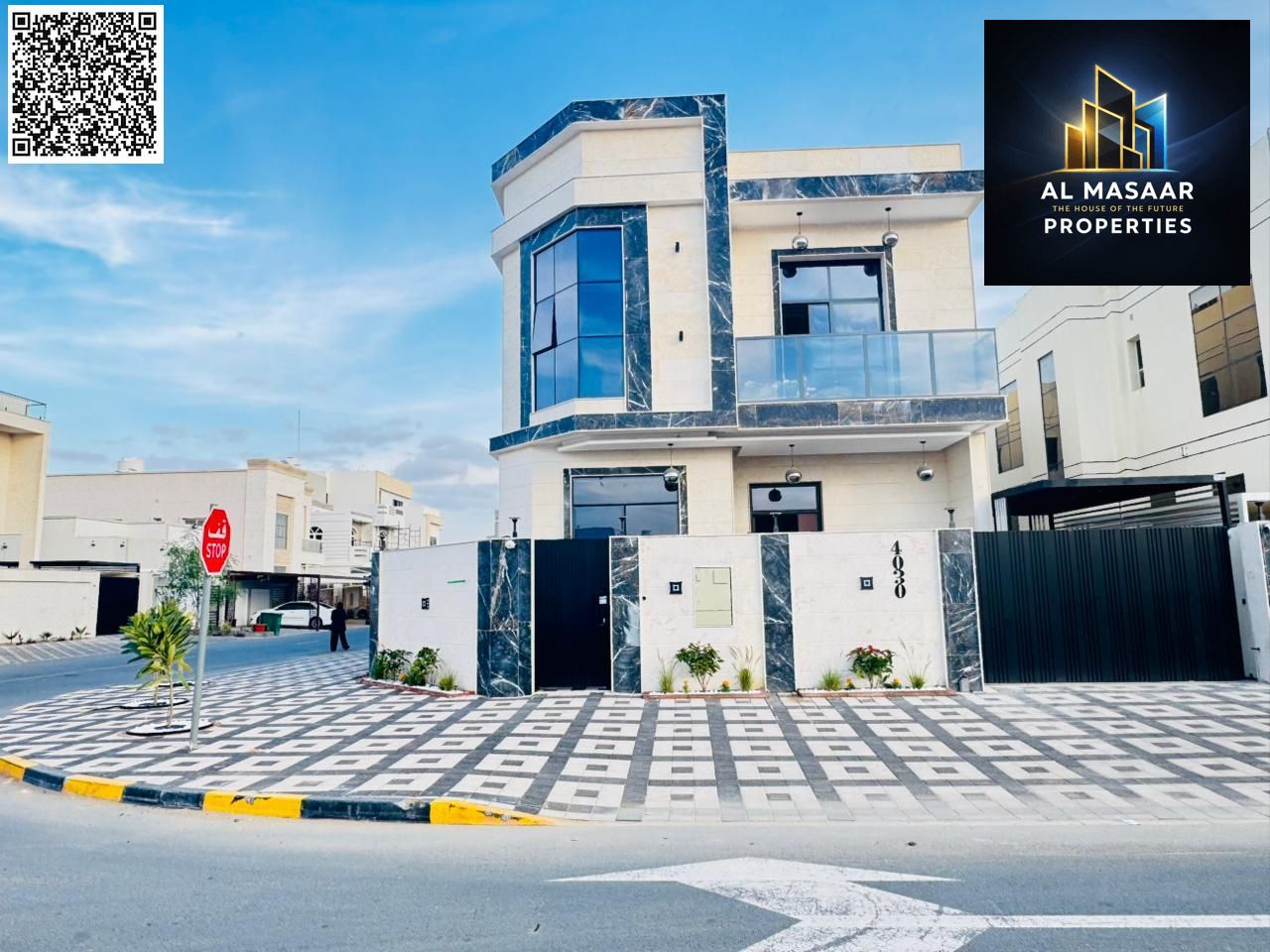 Two-story corner villa with a modern design and high-end finishes, at a special price and in a prime location directly opposite a park and close to al