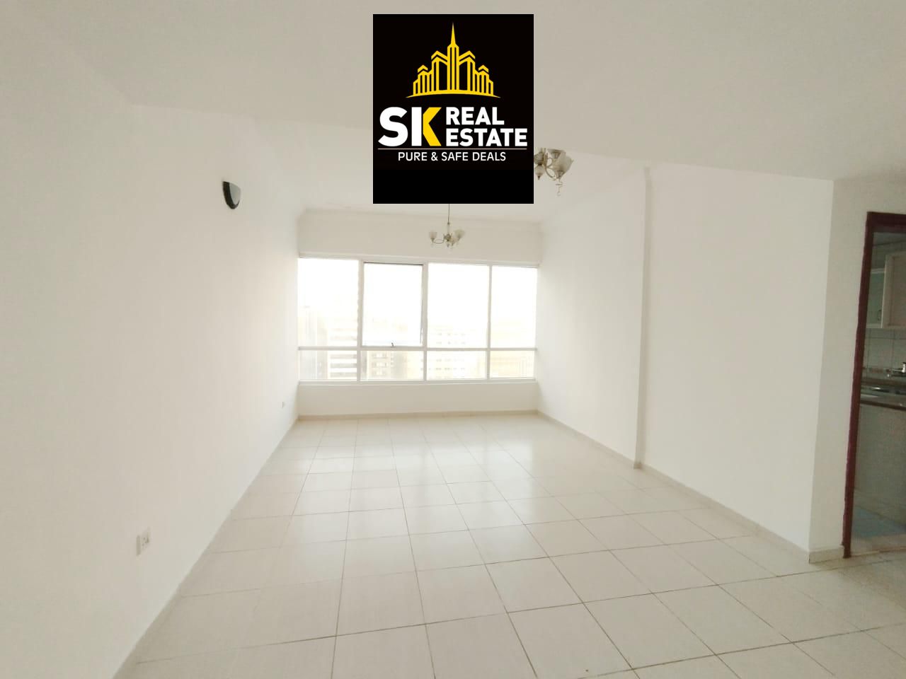SPACIOUS 1BHK APARTMENT+GYM -SWIMMING POOL FREE HUGE SIZE PRIME LOCATION EASY EXIT TO DUBAI