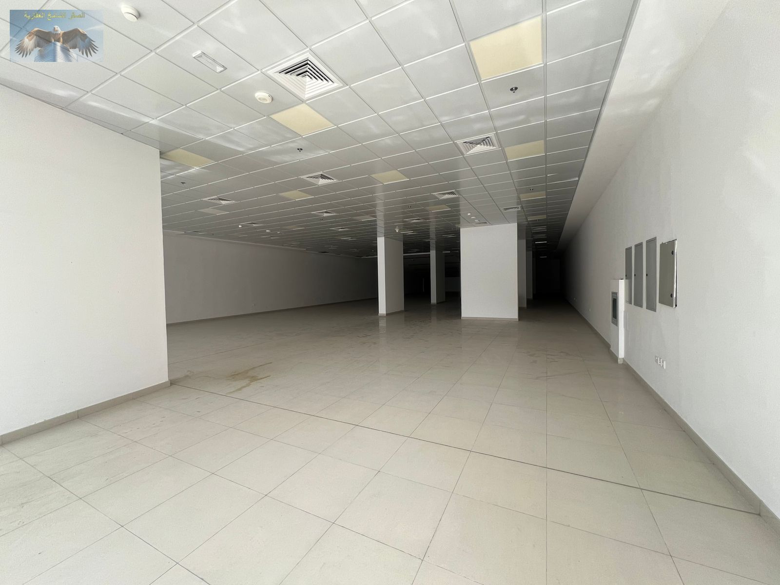 Largest commercial warehouse in Ajman, 13,400 sq ft, spacious open layout, suitable for all commercial activities, with direct frontage on a main road