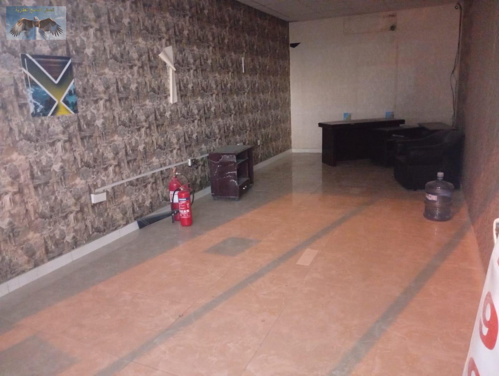 Annual Shop for Rent in Al Rashidiya 1 Behind Ramada Black Hotel in a Prime Location