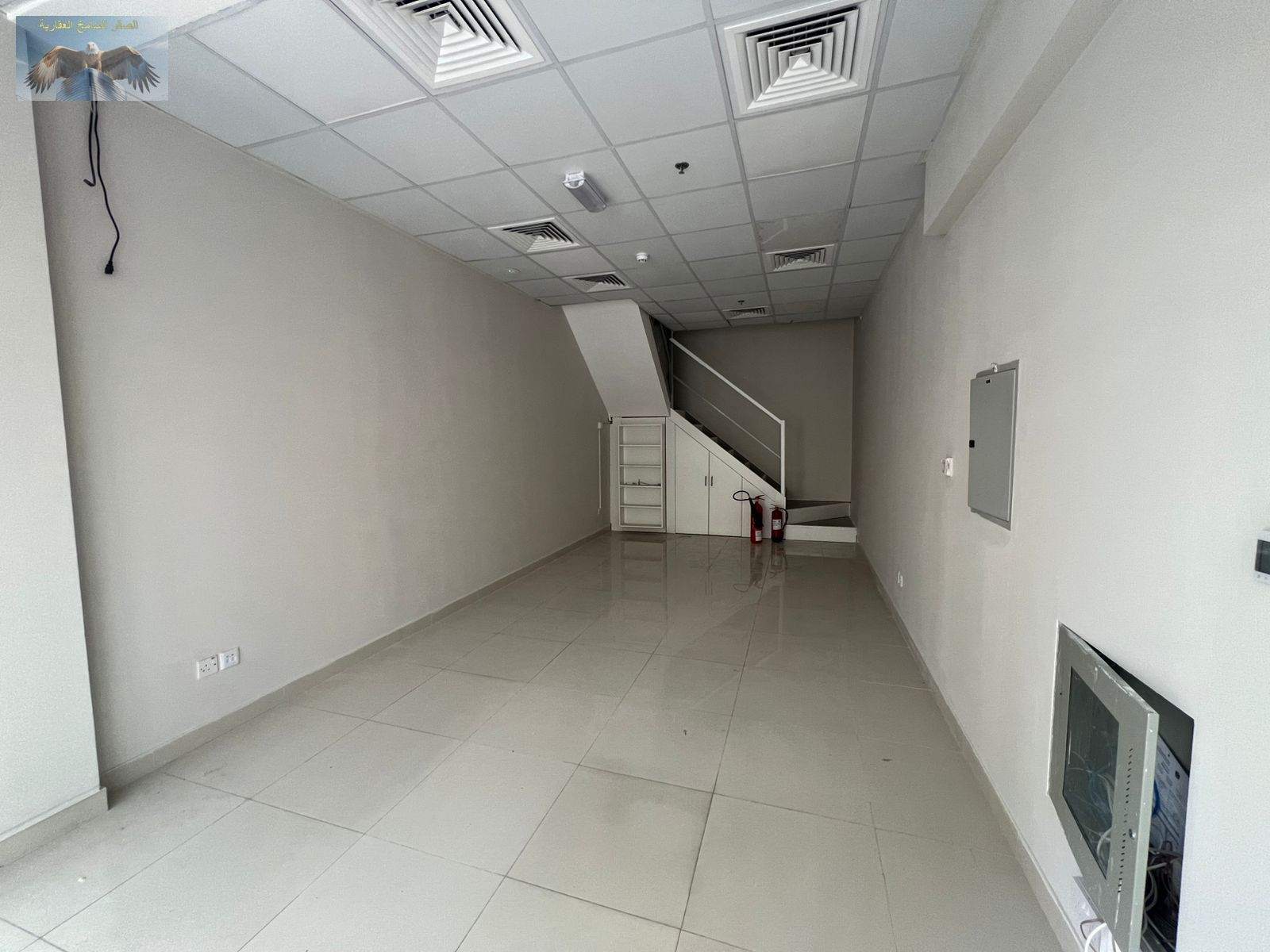 Two-floor commercial shop, 700 sq ft, near Garden City Towers, very prime and lively location with all services nearby.