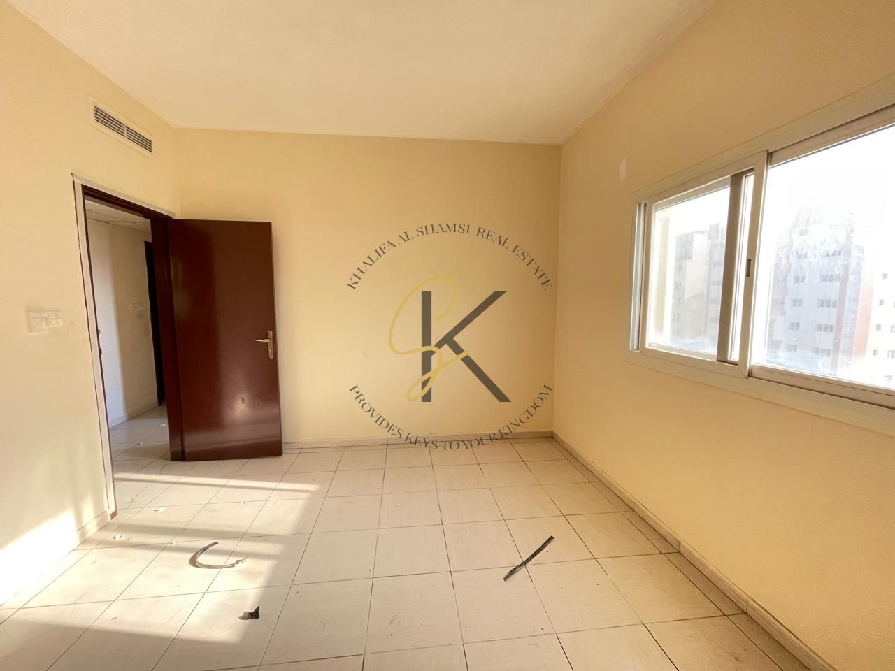 Spacious Unfurnished 2 BHK Apartment with Balcony for Rent in Muwailah, Sharjah | 2 Washrooms | Dedicated Parking | Prime Location | 1300 Sqft | All Amenities