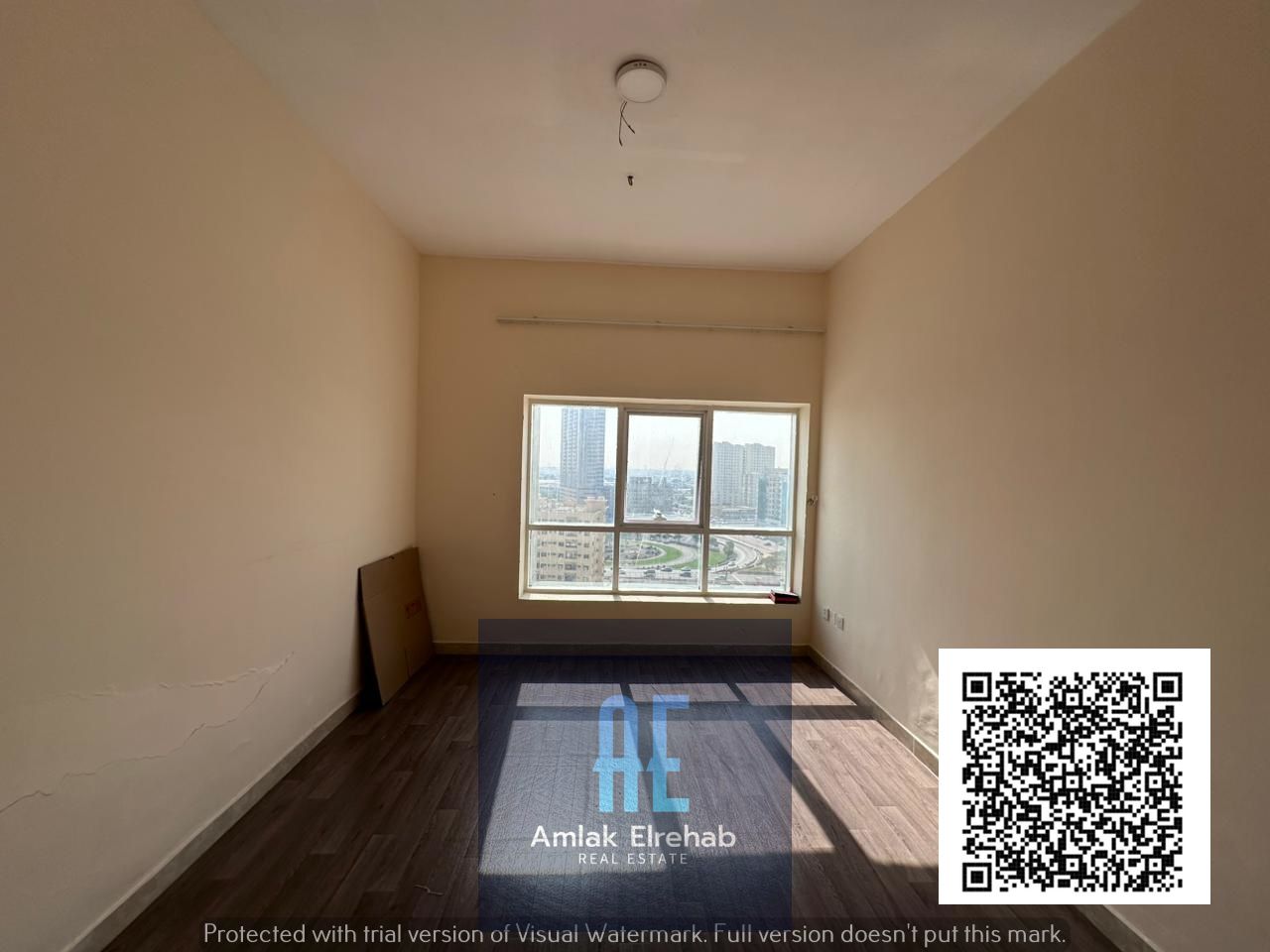 Two-bedroom apartment with a living room and a distinctive view in the Pearl Towers in the heart of Ajman city.
